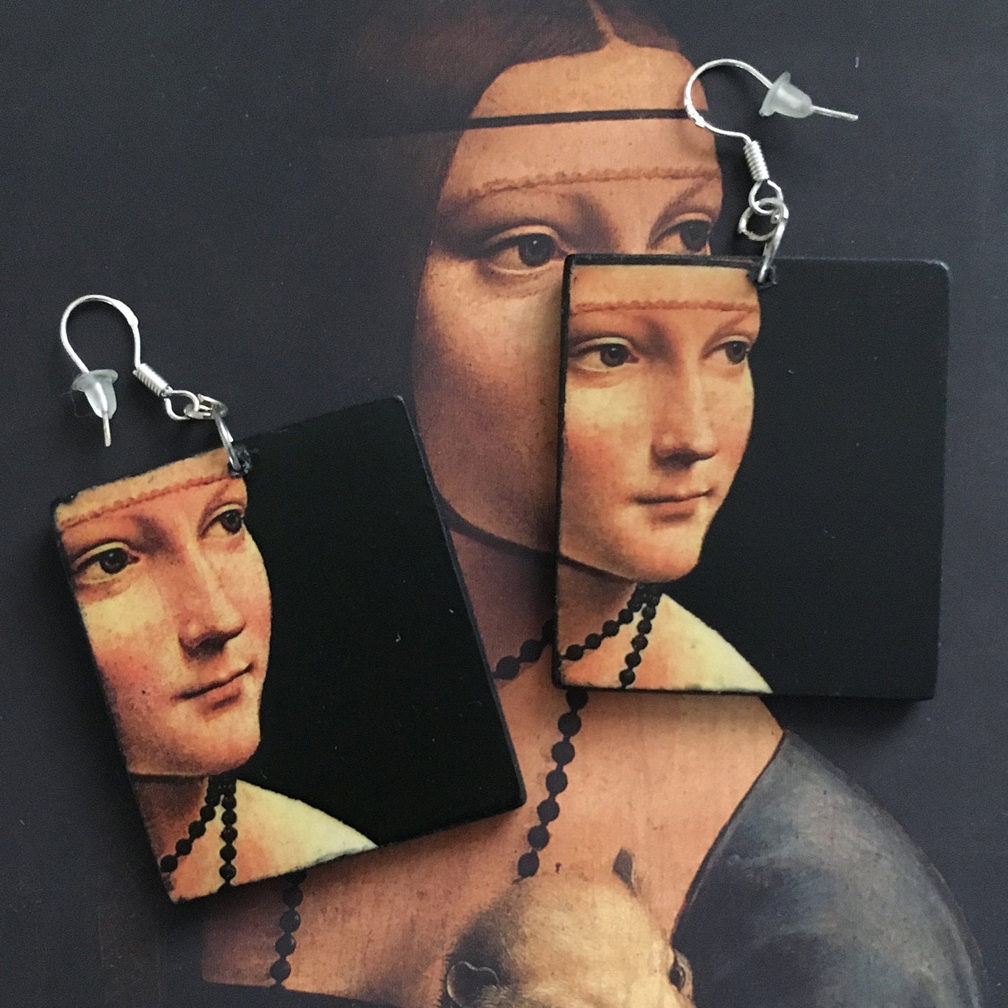 Italian Renaissance artist Leonardo da Vinci and his famous painting "La dama con l'ermellino" inspired Obljewellery to handmade these art wooden earring with sterling silver hooks .