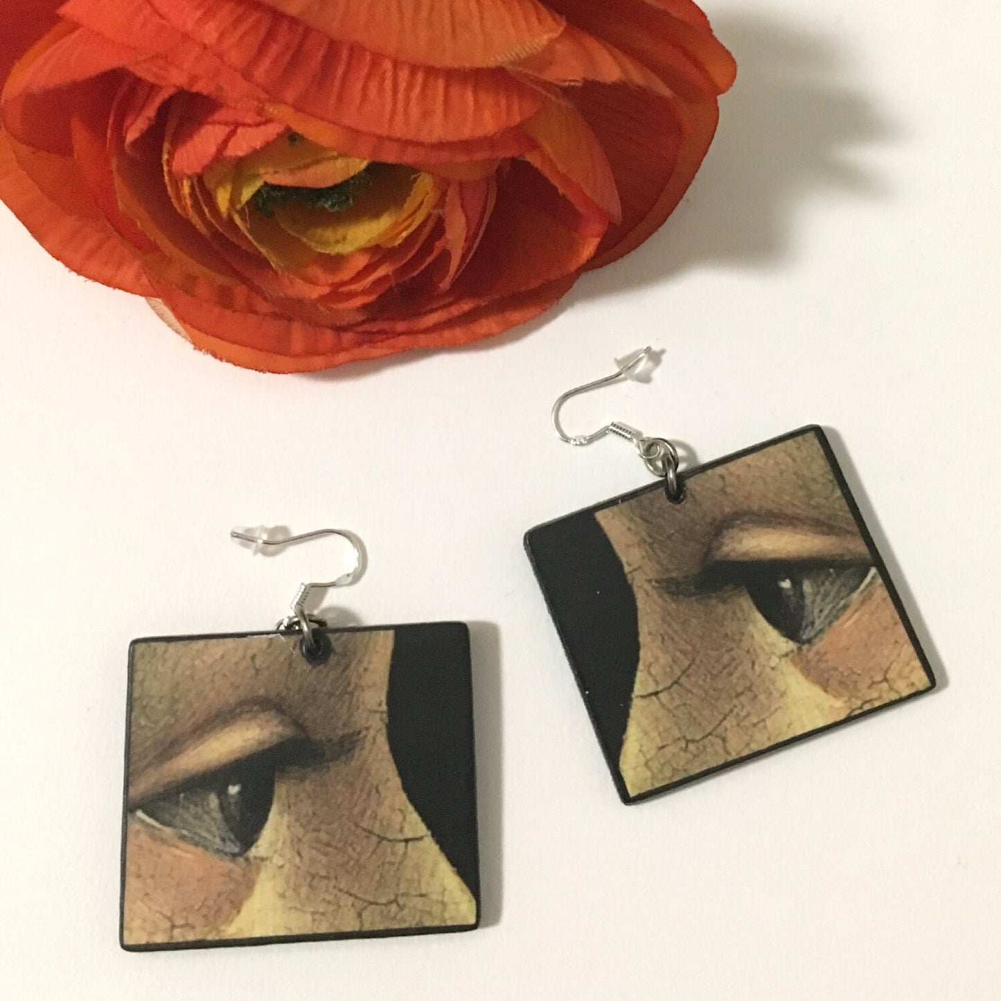 Statement art earrings based on the painting "Portrait of Giovanna Tornabuoni" eye detail by Domenico Ghirlandaio. These handmade wooden earrings are lightweight, the cool artsy, sustainable gift for her.