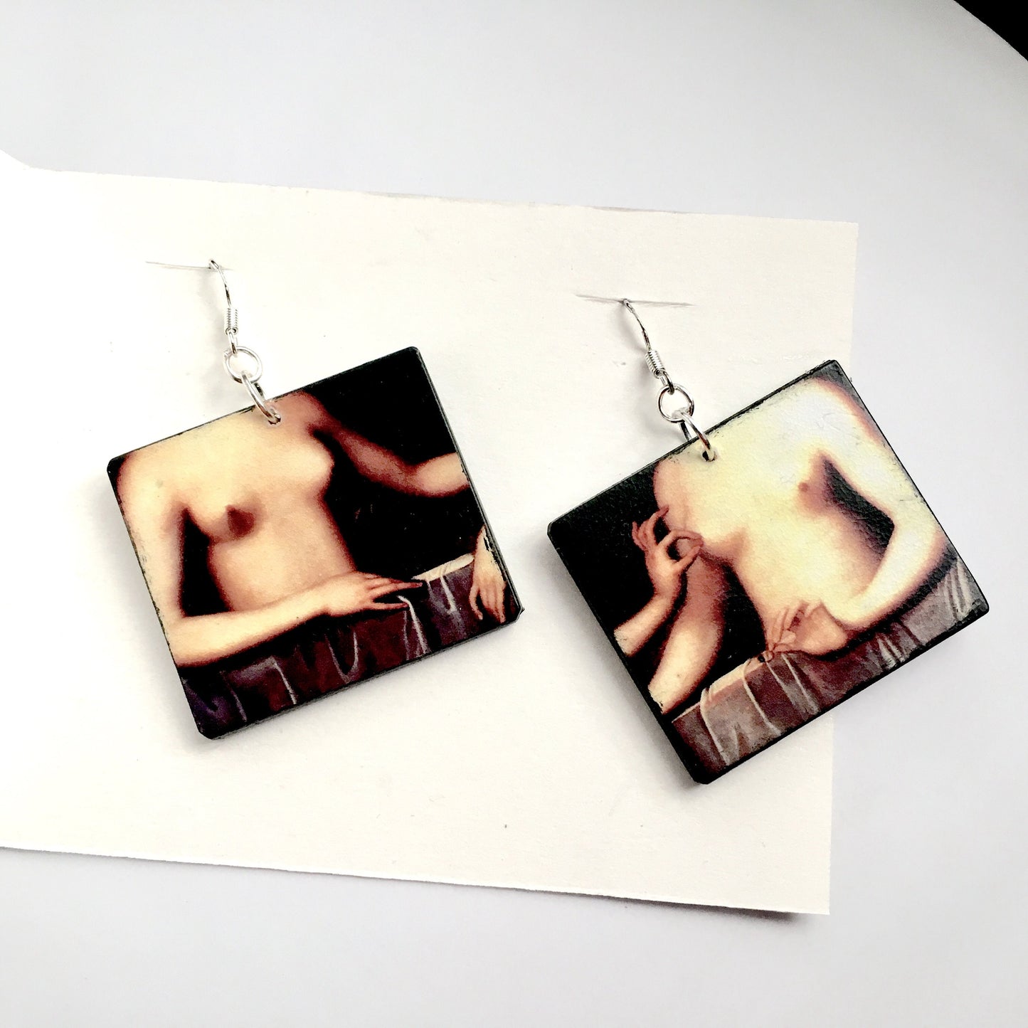 Statement mismatched earrings Ecole Fontainebleau