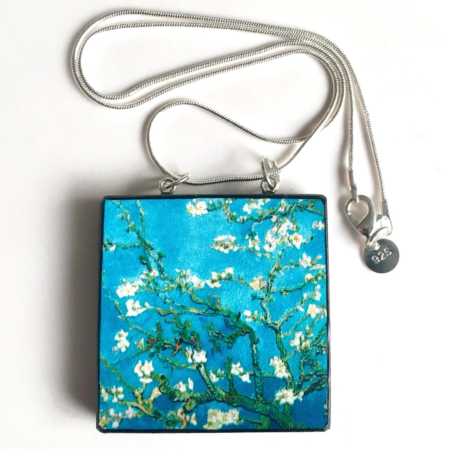 The Van Gogh necklaces is inspired by the masterpiece "Almond Blossom" where the artist painted one of his favourite subjects large flowering branches against a blue sky. The almond tree blooms is a symbol of new life, this painting was a gift for his brother Theo and his wife who had a son. Vincent Van Gogh was inspired by Japanese prints. Vincent van Gogh (1853 - 1890), Saint-Rémy-de-Provence, February 1890 oil on canvas, 73.3 cm x 92.4 cm