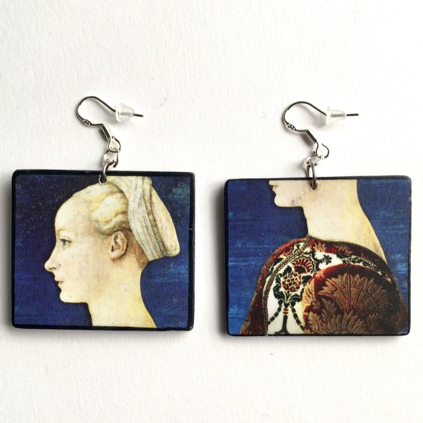 Antonio del Pollaiuolo inspired art earrings and Obljewellery logo! These handmade art earrings are very light to wear. Profile Portrait of Young Lady is the oil painting detail on top of these sustainable, aesthetic, art earrings on wood and sterling silver hooks. Perfect art teacher gift.