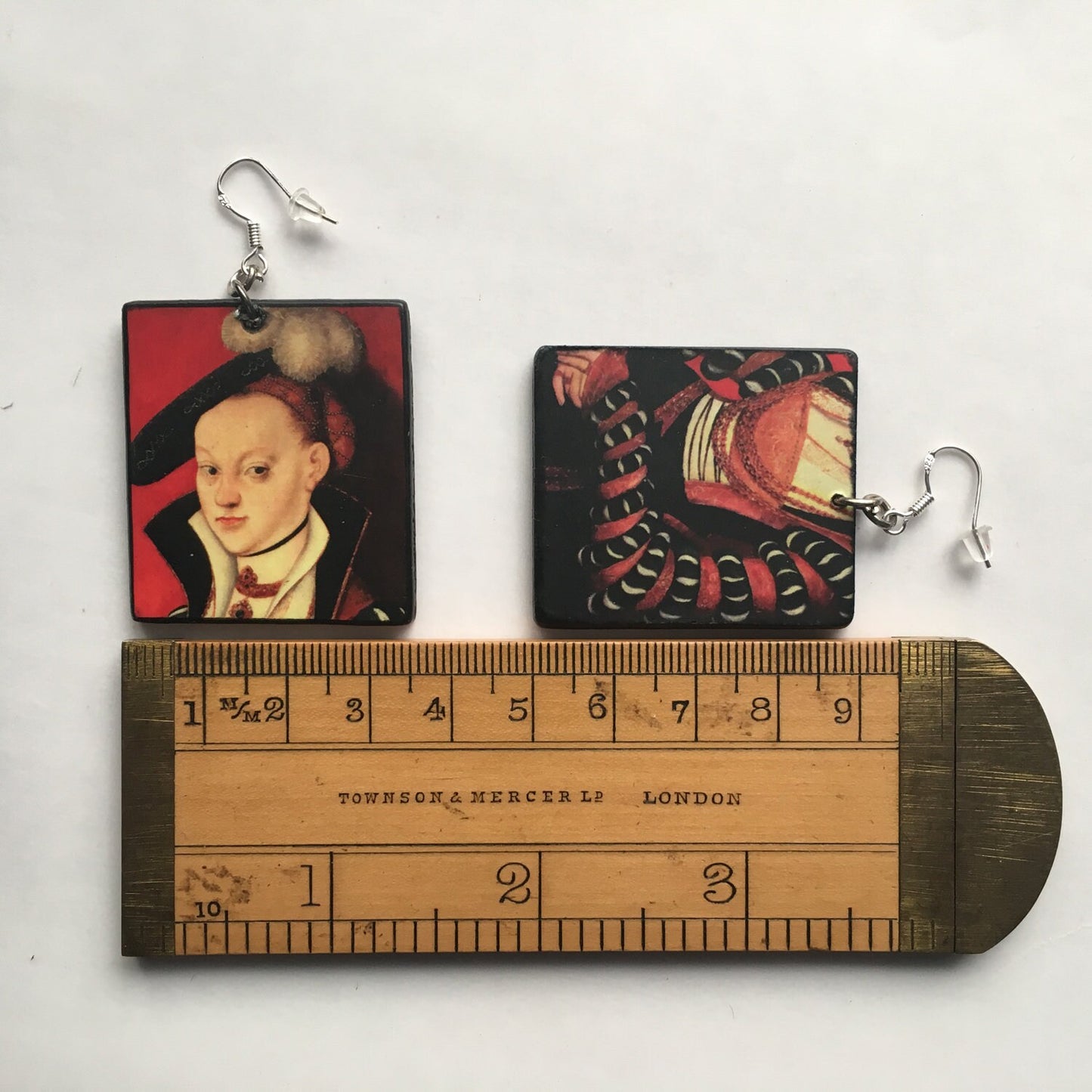 red coloured art rearrings inspired by Lucas Cranach Renaissance artist. Obljewellery Artsy gifts