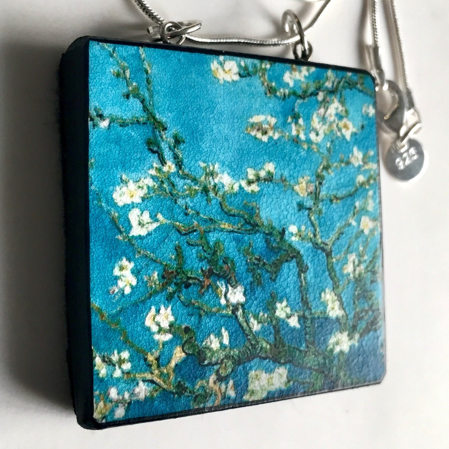 The Van Gogh necklaces is inspired by the masterpiece "Almond Blossom" where the artist painted one of his favourite subjects large flowering branches against a blue sky. The almond tree blooms is a symbol of new life, this painting was a gift for his brother Theo and his wife who had a son. Vincent Van Gogh was inspired by Japanese prints. Vincent van Gogh (1853 - 1890), Saint-Rémy-de-Provence, February 1890 oil on canvas, 73.3 cm x 92.4 cm