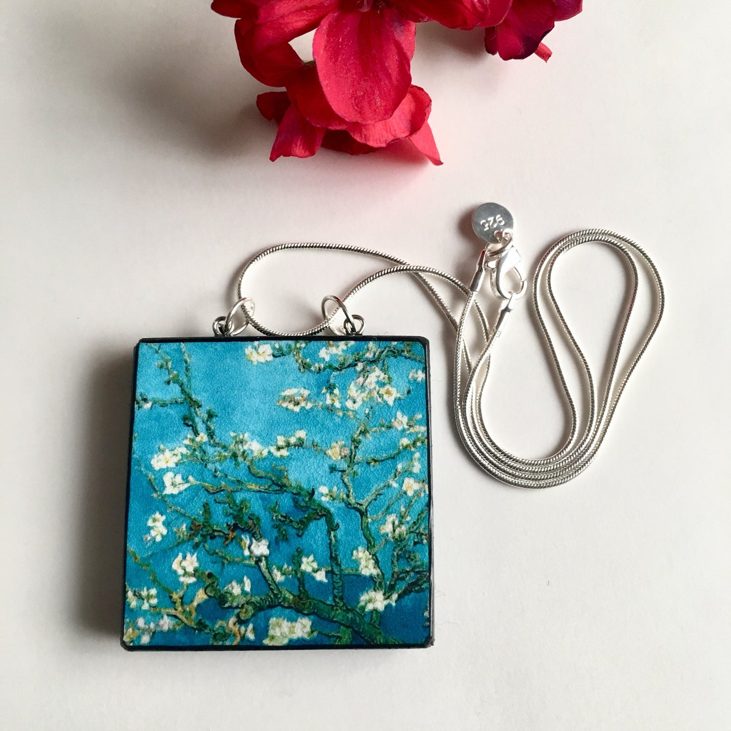 The Van Gogh necklaces is inspired by the masterpiece "Almond Blossom" where the artist painted one of his favourite subjects large flowering branches against a blue sky. The almond tree blooms is a symbol of new life, this painting was a gift for his brother Theo and his wife who had a son. Vincent Van Gogh was inspired by Japanese prints. Vincent van Gogh (1853 - 1890), Saint-Rémy-de-Provence, February 1890 oil on canvas, 73.3 cm x 92.4 cm
