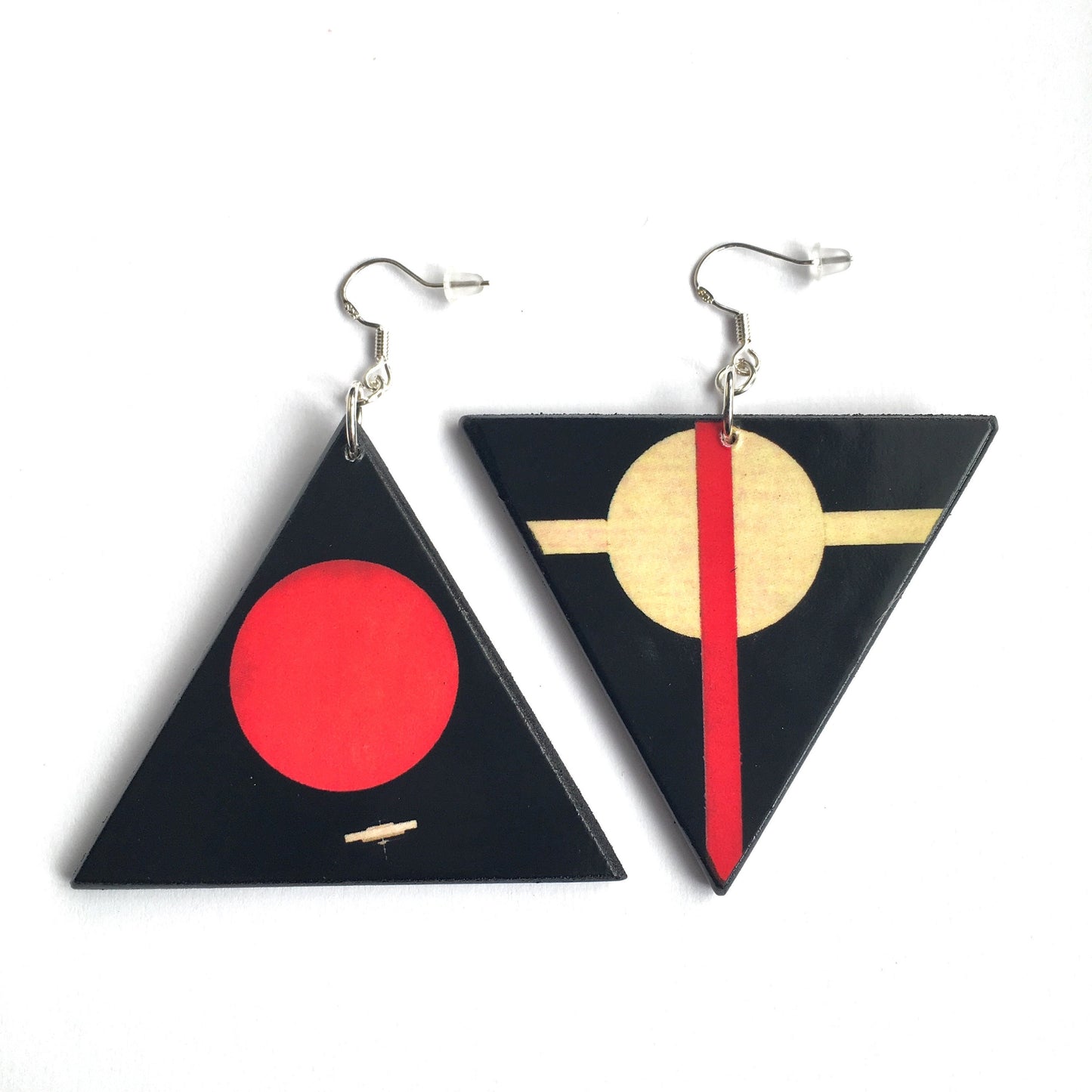 Mismatched and asymmetrical drop earrings inspired by Suprematist artist Il'ia Chashnik. on wood with sterling silver hooks.