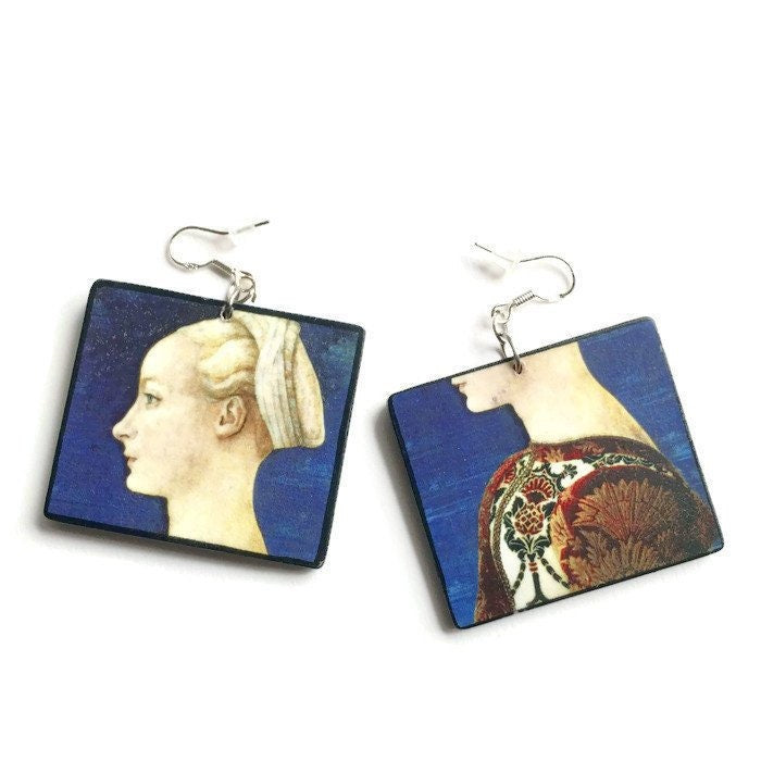 Antonio del Pollaiuolo inspired art earrings and Obljewellery logo! These handmade art earrings are very light to wear. Profile Portrait of Young Lady is the oil painting detail on top of these sustainable, aesthetic, art earrings on wood and sterling silver hooks. Perfect art teacher gift.