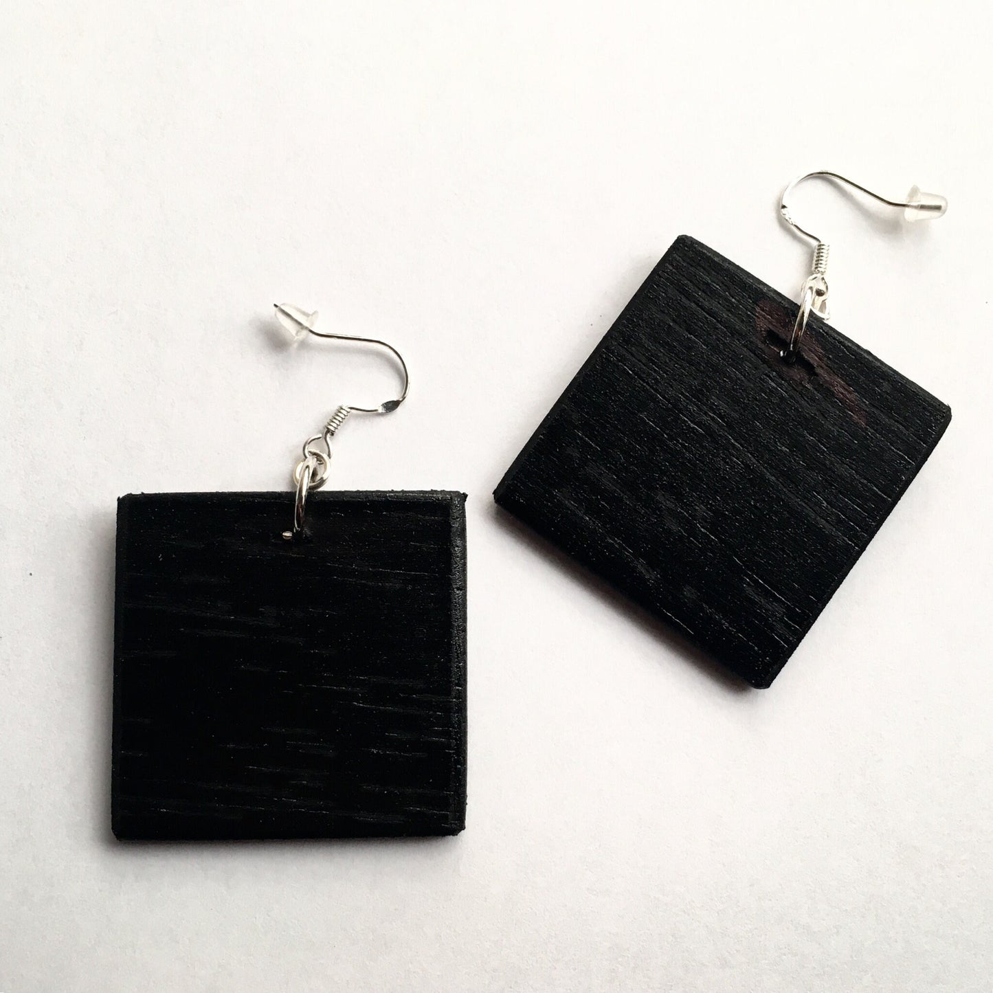 Mismatched earrings inspired by Mondrian.
