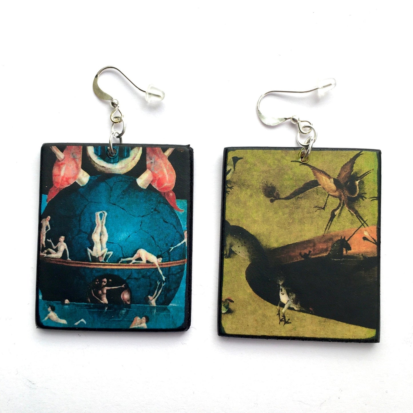 based on the oil painting The Garden of Earthly Delights Plated silver hooks and sustainable wood. OBLJEWELLERY has high quality jewellery very durable and light weight.