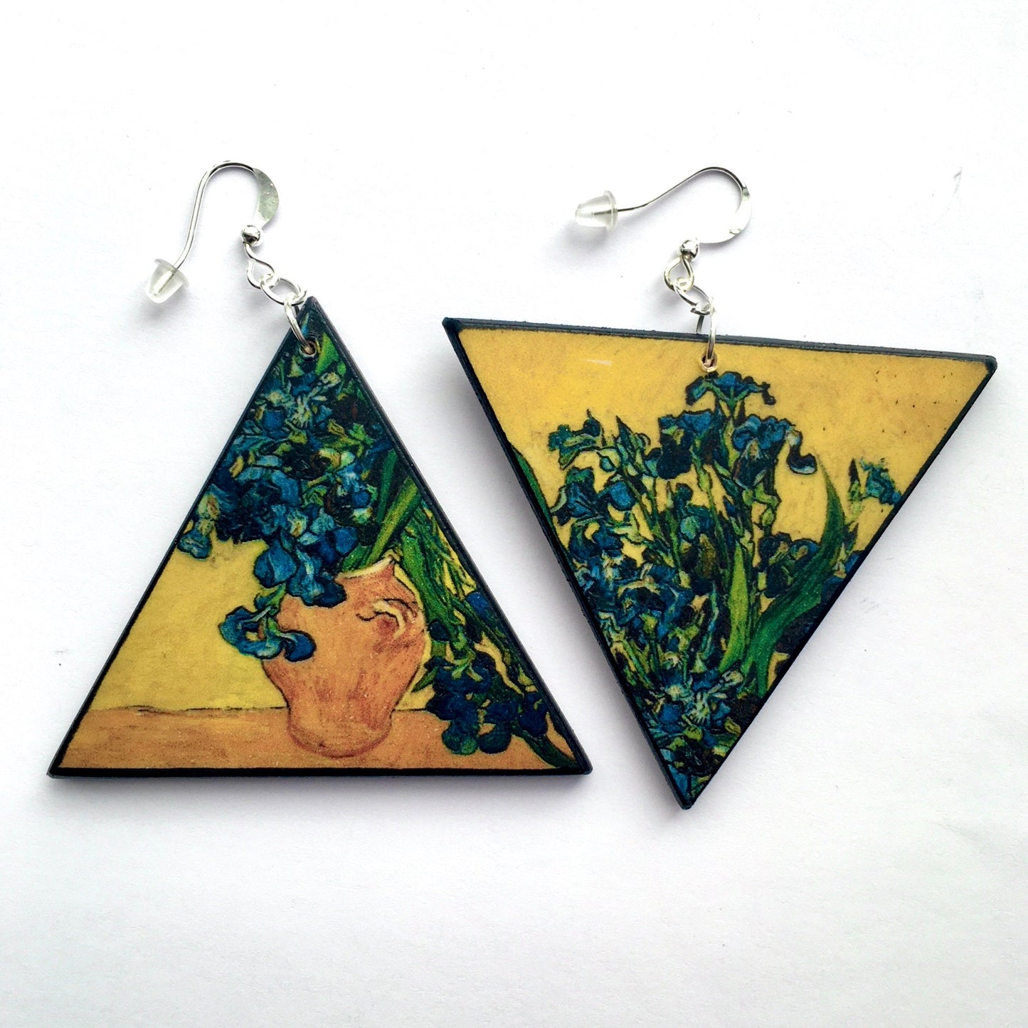Van Gogh triangular, asymmetrical and mismatched earrings with a detail of the painting Vase with Irises against a Yellow Background. these earrings are made with sustainable wood.