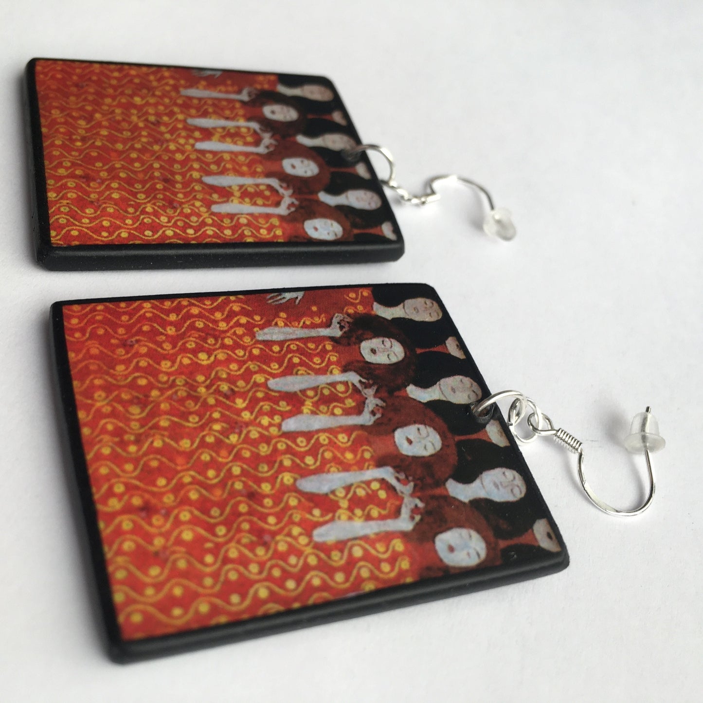 Aesthetic handmade earrings on wood inspired by painting "Beethoven Frieze" which was based on Wagner's interpretation of Beethoven's Ninth Symphony. Obljewellery artsy gift shop. The sustainable wood and sterling silver hook earrings are an alternative art gift for woman.