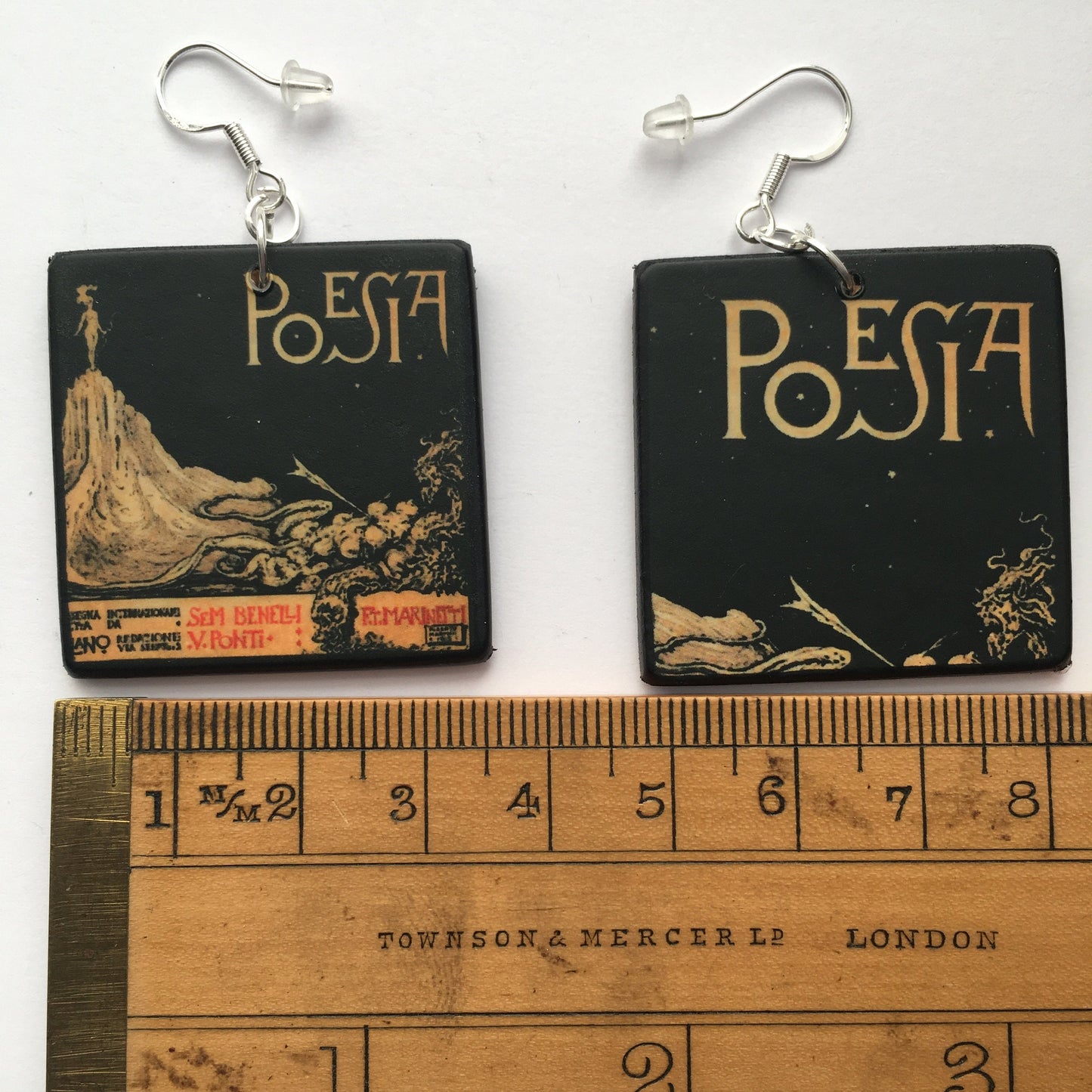 Poem book mismatched earrings. Italian Marinetti art cover.
