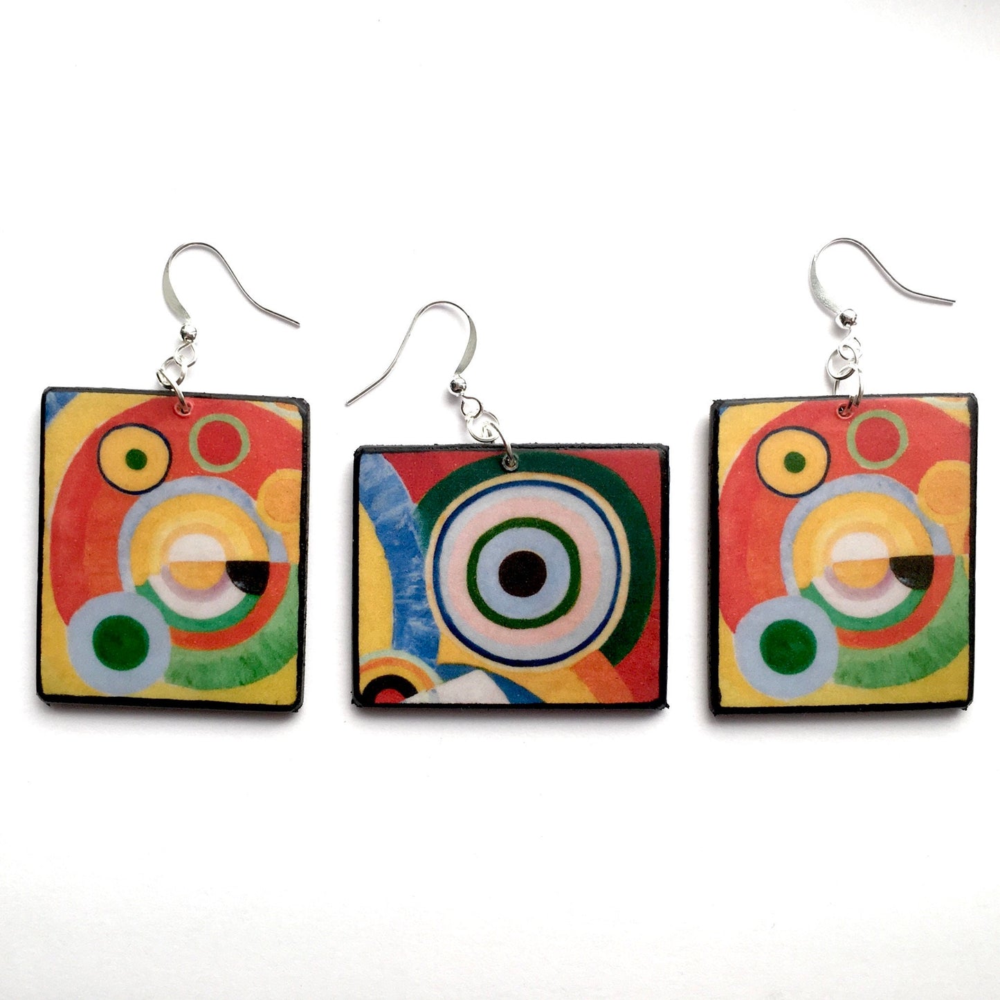 Three asymmetrical, geometric, colourful art earrings inspired by Robert Delaunay famous painting "Rythme, Joie de vivre". Sustainable wood and plated silver hooks. Dimensions: cm 4 x 3.5 x 3mm approx.