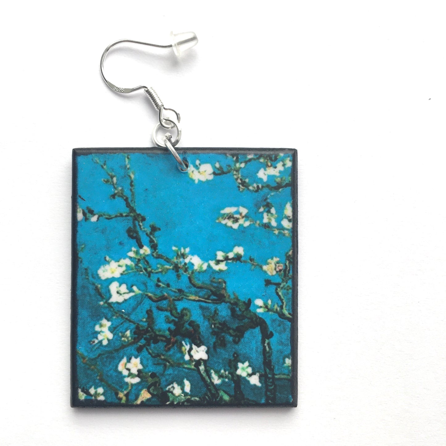 Sustainable wood earrings 4cm x 3.5 cm x 2/3 mm approx. Sterling silver 925 hooks. The Van Gogh artsy earrings are inspired by the masterpiece "Almond Blossom" where the artist painted one of his favourite subjects large flowering branches against a blue sky. The almond tree blooms is a symbol of new life, this painting was a gift for his brother Theo and his wife who had a son. Vincent Van Gogh was inspired by Japanese prints.