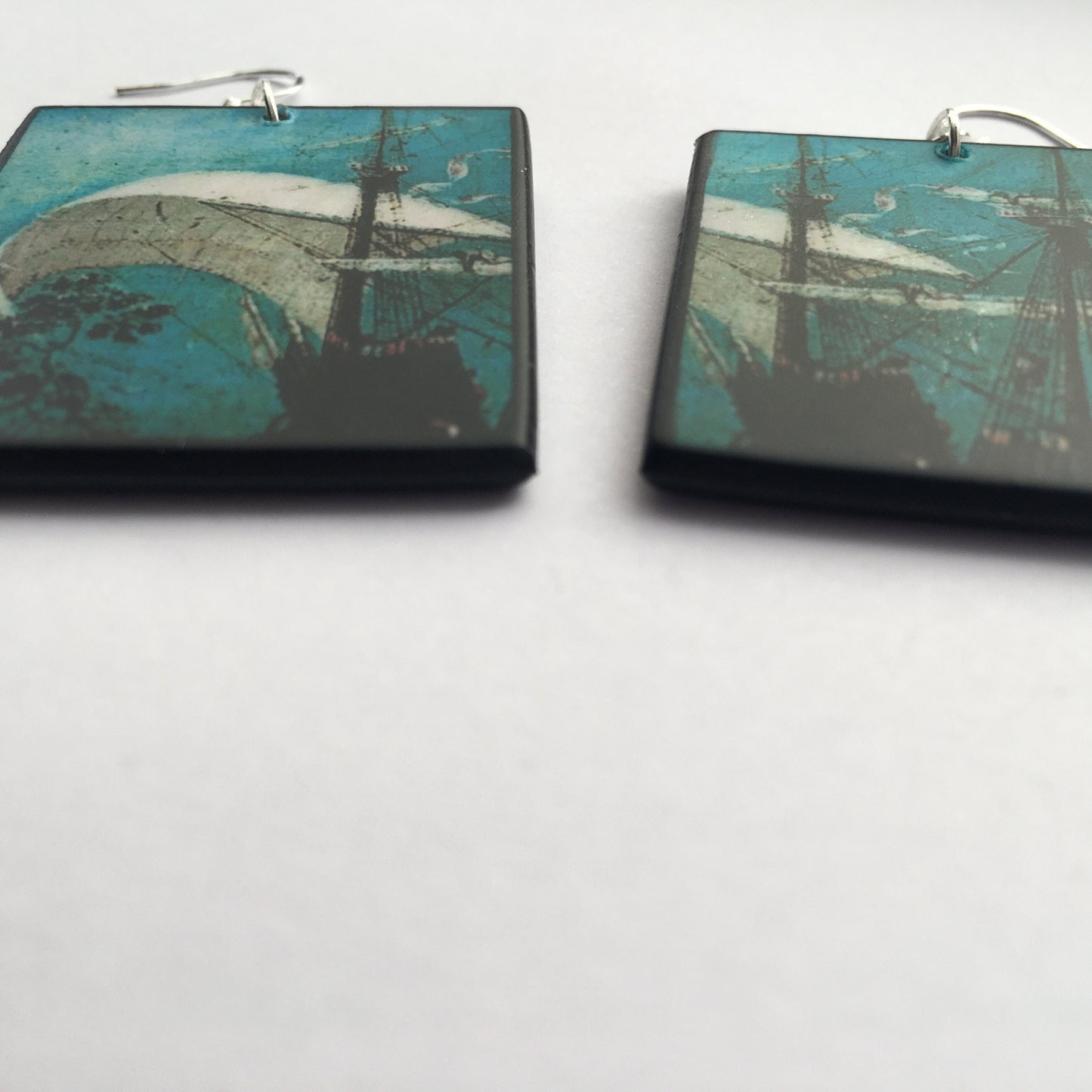 Wooden mismatched art earrings. Summer birthday gift for her. Masted sailing ship,detail of oil painting by famous artist Pieter Bruegel.