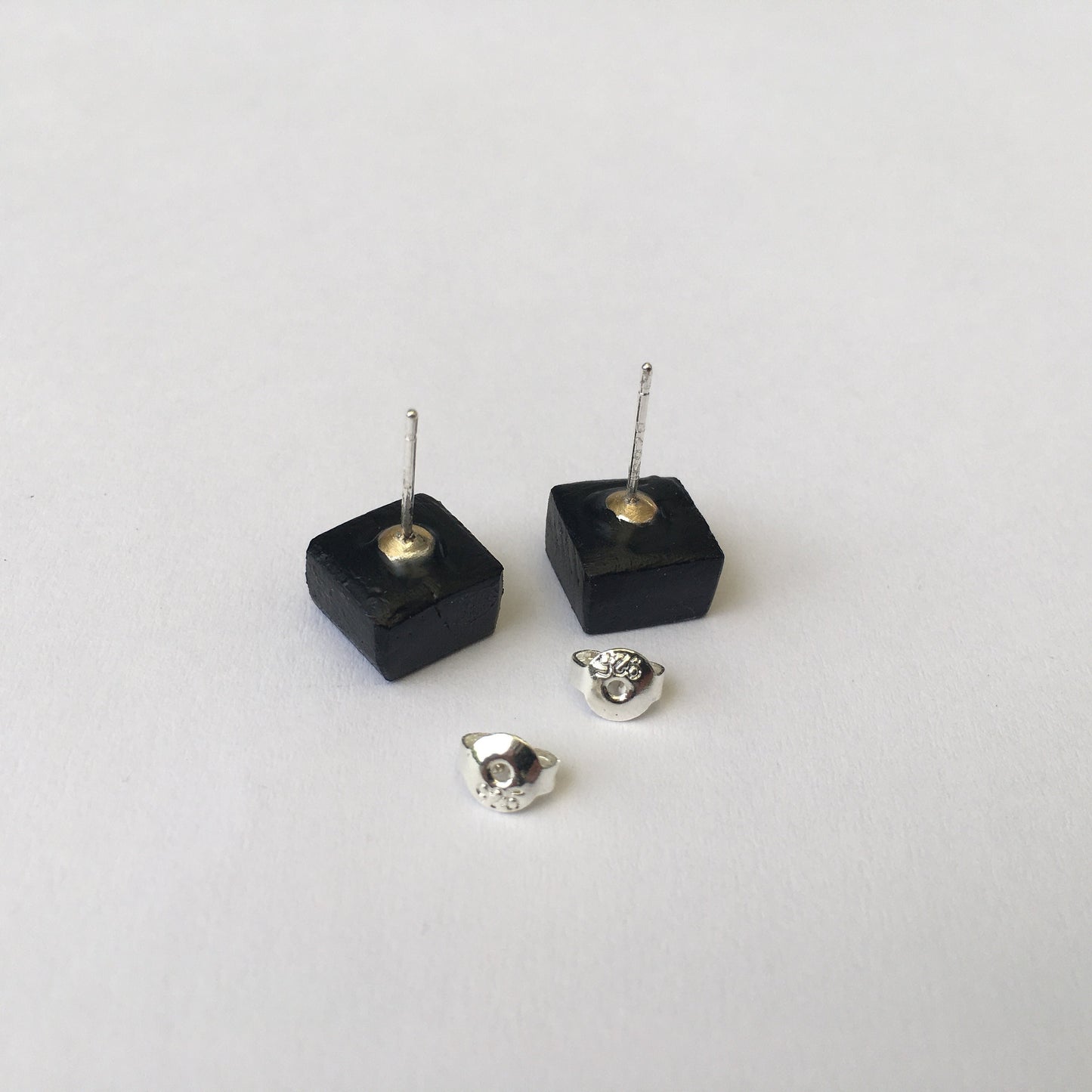Leonardo da Vinci, sterling silver and wood earrings.