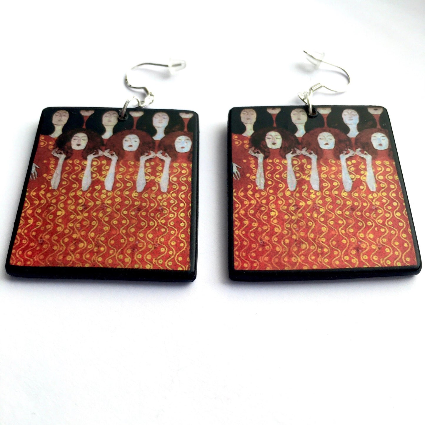 Aesthetic handmade earrings on wood inspired by painting "Beethoven Frieze" which was based on Wagner's interpretation of Beethoven's Ninth Symphony. Obljewellery artsy gift shop. The sustainable wood and sterling silver hook earrings are an alternative art gift for woman.