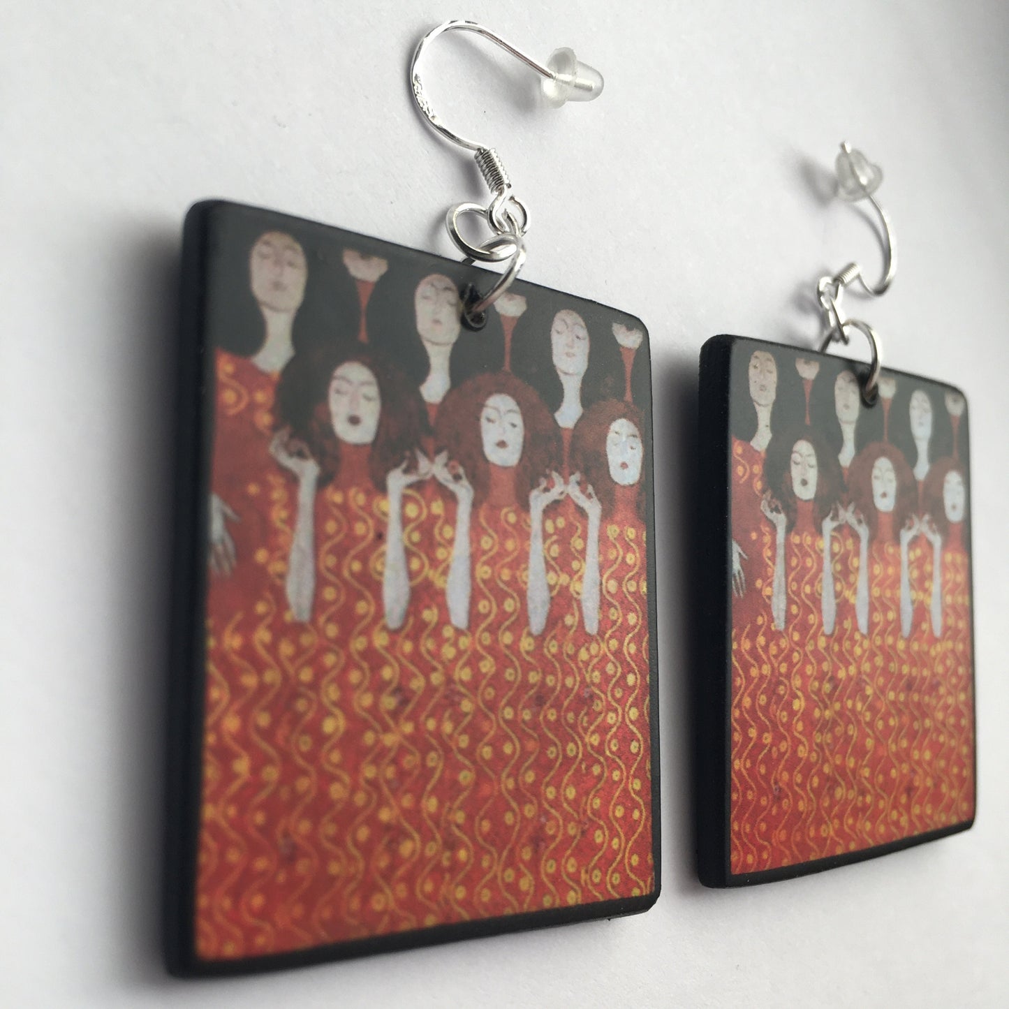 Aesthetic handmade earrings on wood inspired by painting "Beethoven Frieze" which was based on Wagner's interpretation of Beethoven's Ninth Symphony. Obljewellery artsy gift shop. The sustainable wood and sterling silver hook earrings are an alternative art gift for woman.