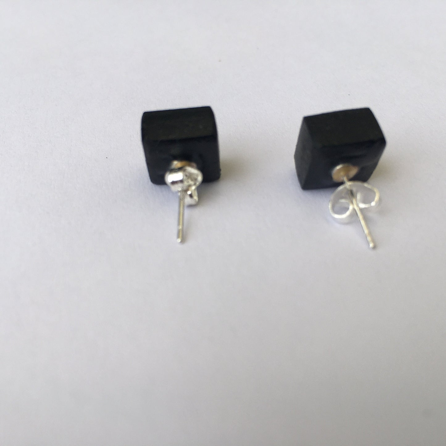 Leonardo da Vinci, sterling silver and wood earrings.