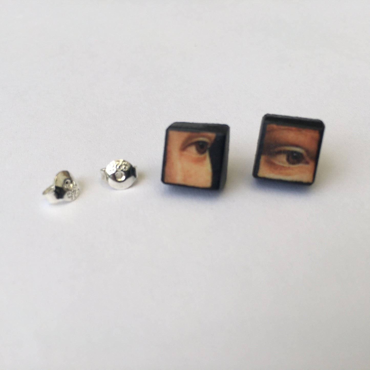 Leonardo da Vinci, sterling silver and wood earrings.