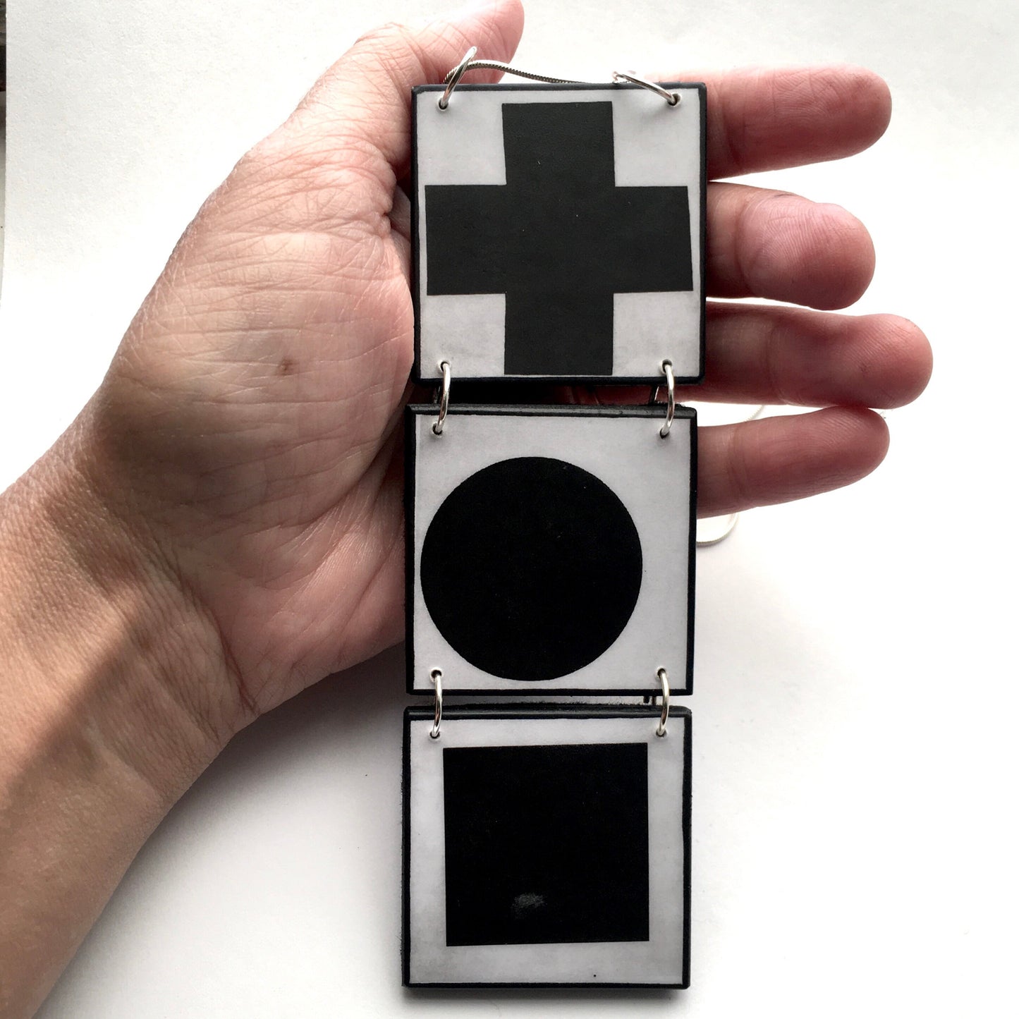 Black Cross, Black Circle, Black Square, Obljewellery is inspired by Kazimir Malevich and his Suprematist paintings for this Necklace pendant.