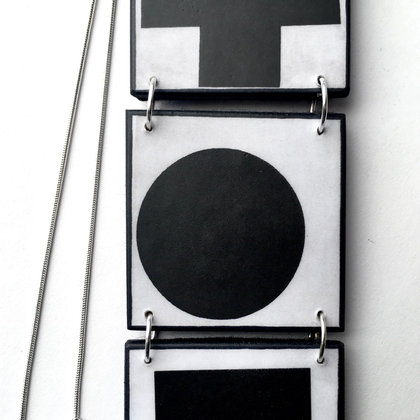 Black Cross, Black Circle, Black Square, Obljewellery is inspired by Kazimir Malevich and his Suprematist paintings for this Necklace pendant.