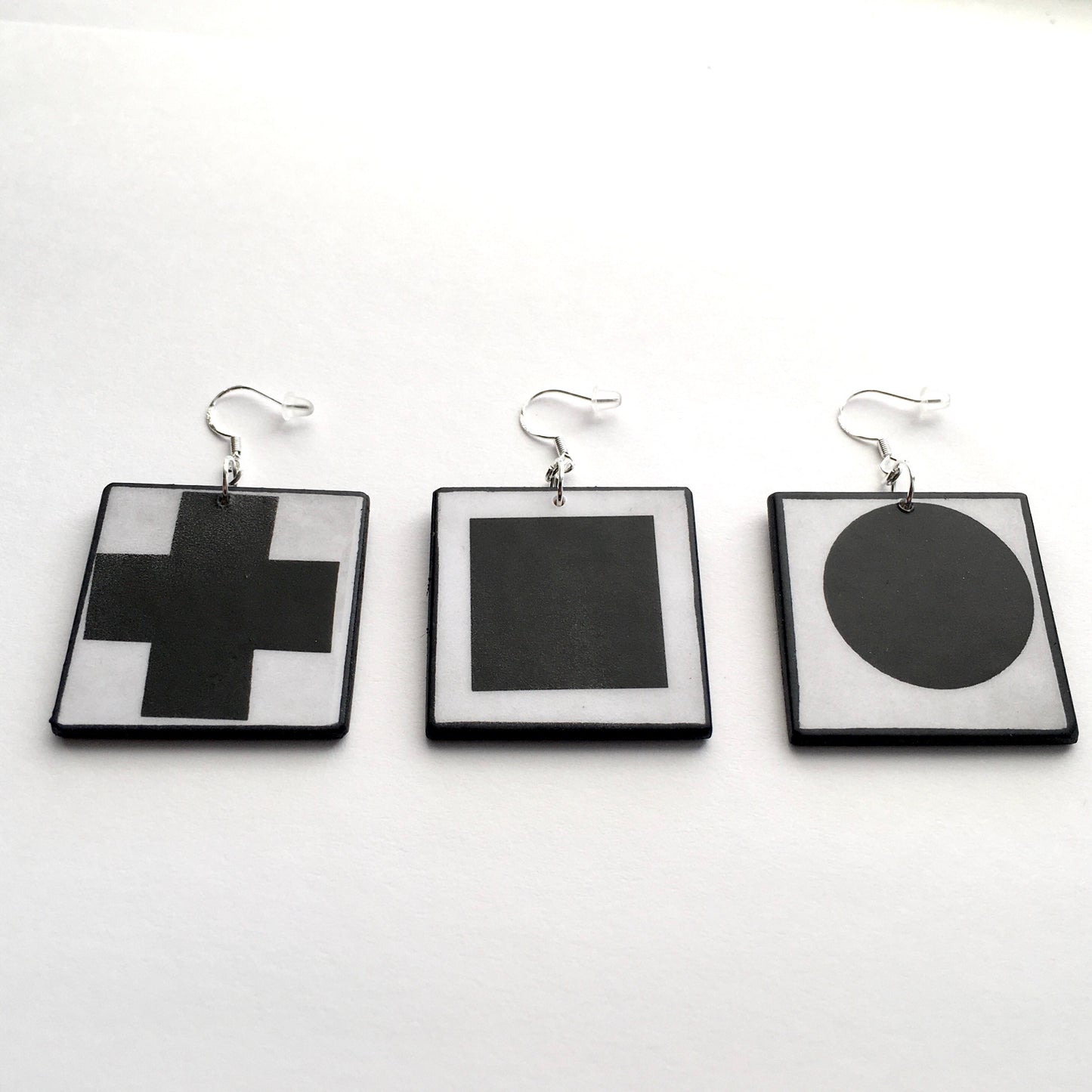 Geometric, abstract, statement art earrings inspired Obljewellery by Kazimir Malevich and his paintings in Suprematism style. Black Cross, Black Circle and Black Square