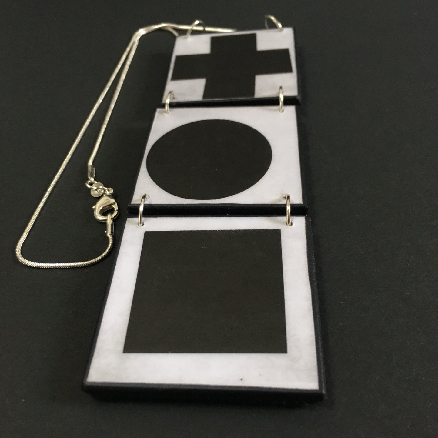 Black Cross, Black Circle, Black Square, Obljewellery is inspired by Kazimir Malevich and his Suprematist paintings for this Necklace pendant.