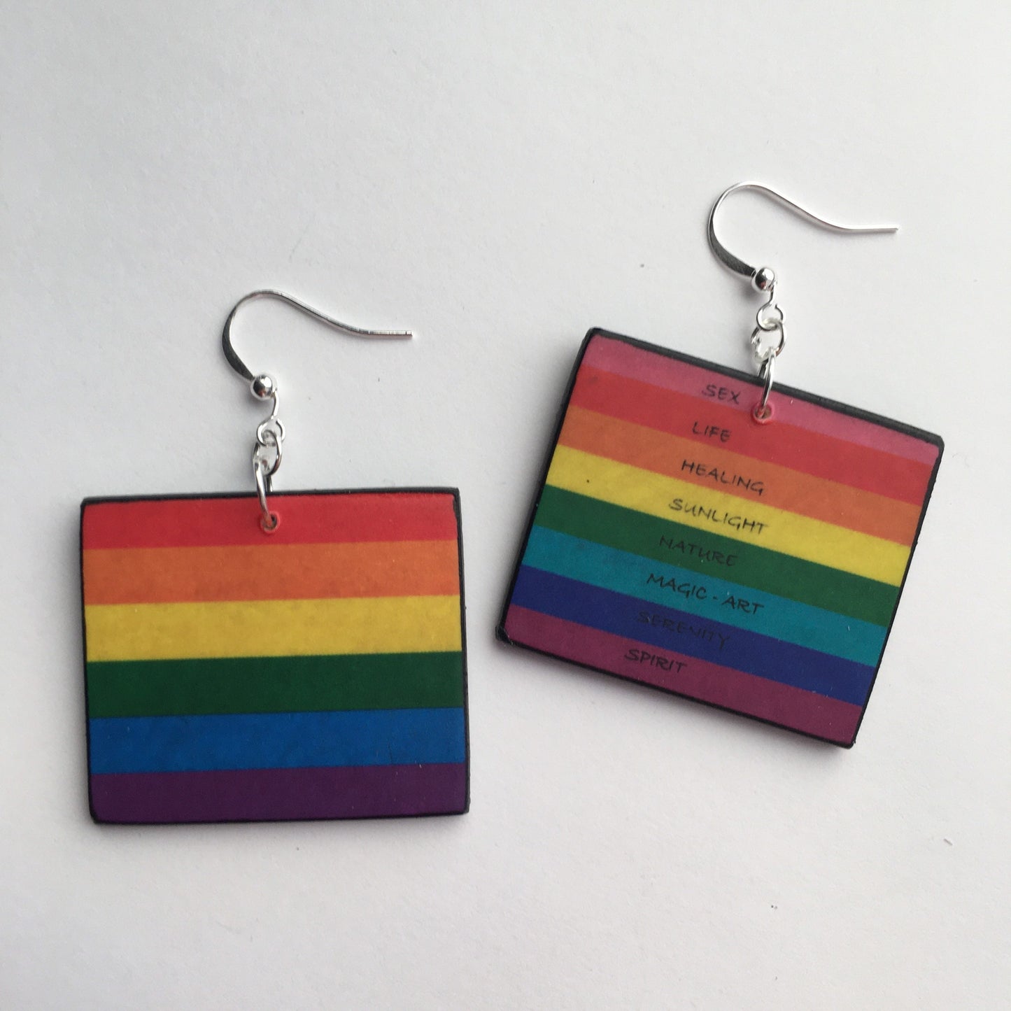 LGBT flag art wooden and plated silver hooks earrings handmade by Obljewellery, aesthetic, artsy gift. Statement, coloured earrings, one with eight-stripe version designed by Gilbert Baker
