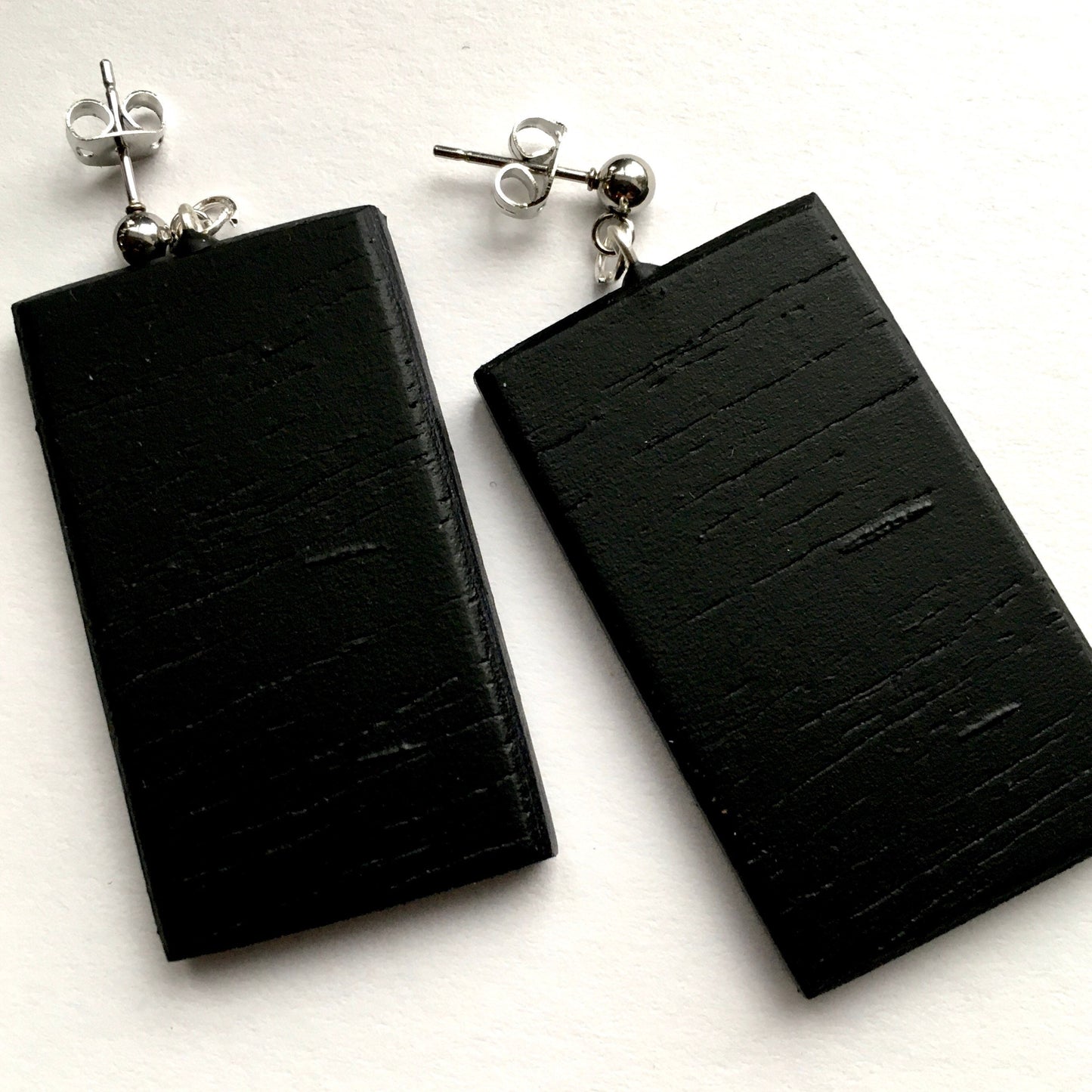 Earrings on wood inspired by Ernst Haeckel illustration