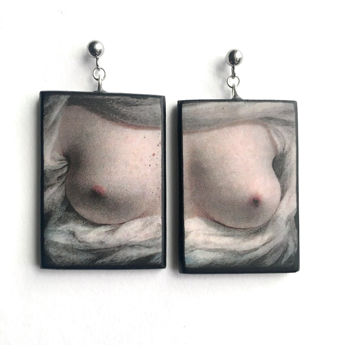 Sustainable wooden handmade stud earrings inspired by the American artist Sarah Goodridge and her miniature painting Beauty Revealed. Obljewellery mismatched earrings