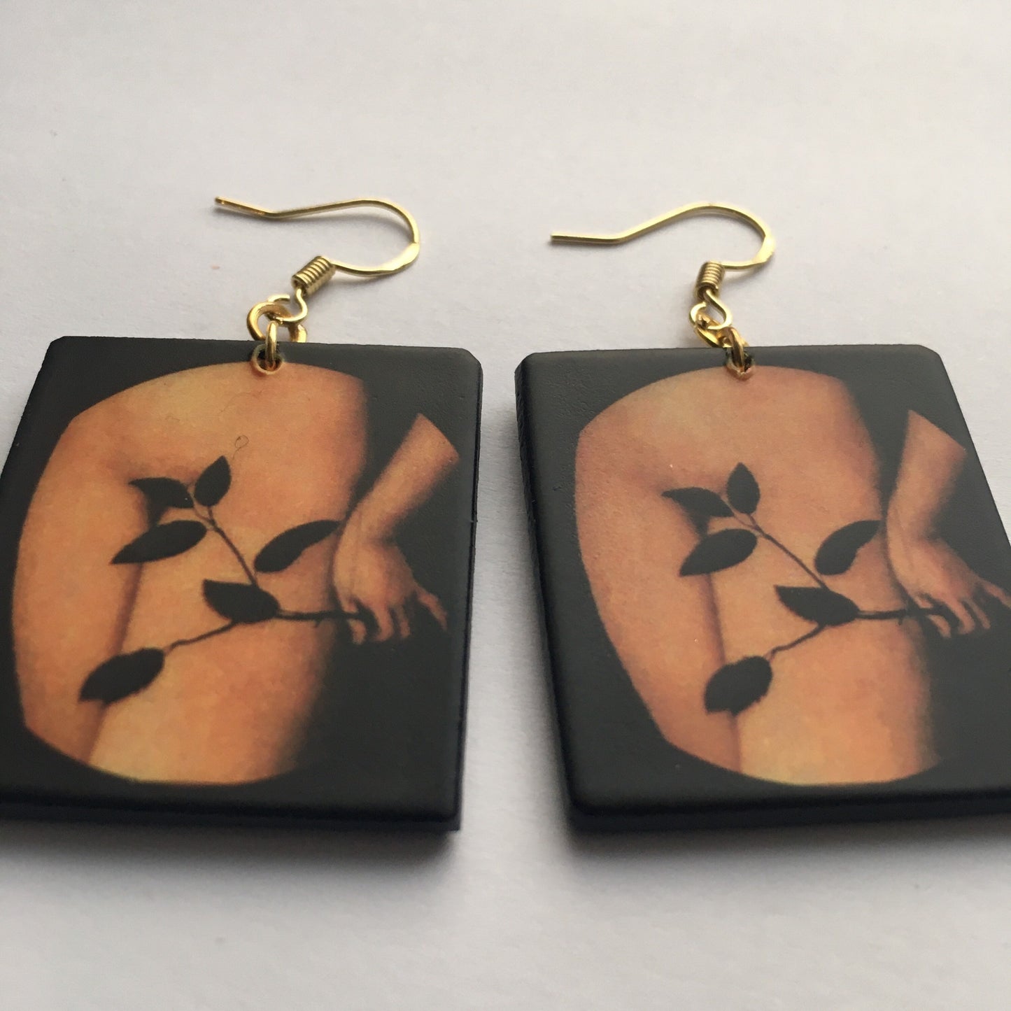 Sensual art earring inspired by Lucas Cranach.