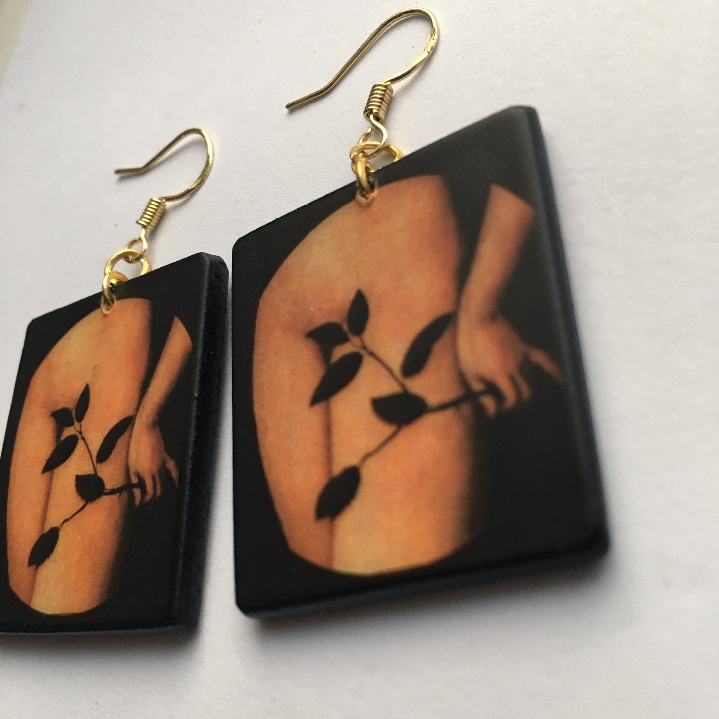Sensual art earring inspired by Lucas Cranach.