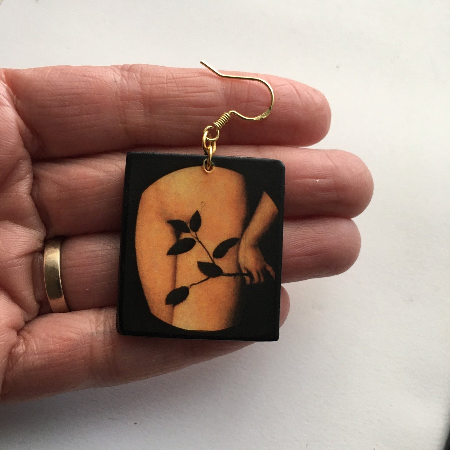 Sensual art earring inspired by Lucas Cranach.