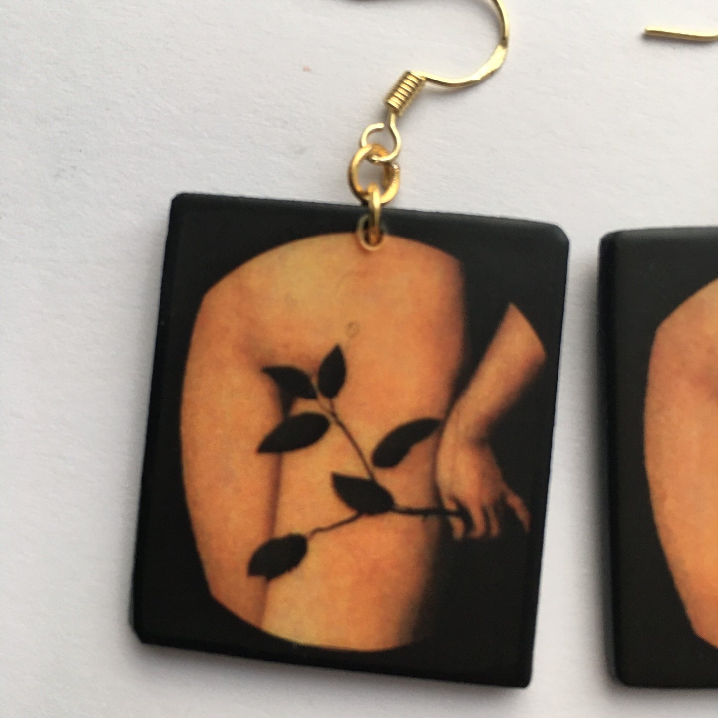 Sensual art earring inspired by Lucas Cranach.