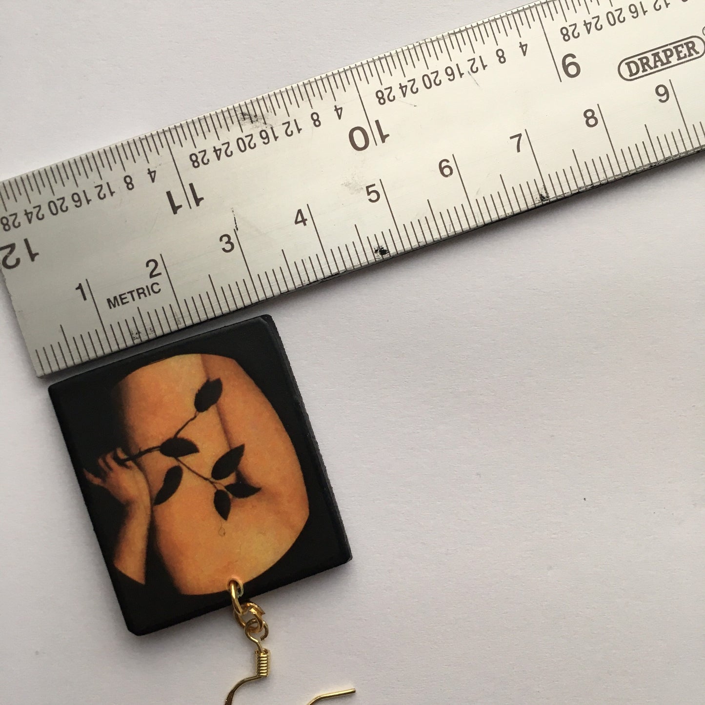 Sensual art earring inspired by Lucas Cranach.