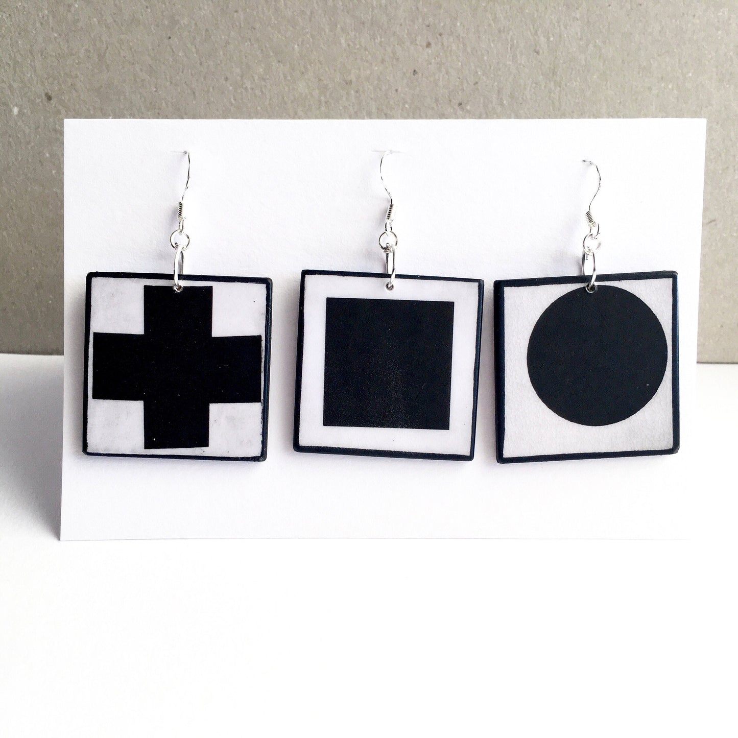 Geometric, abstract, statement art earrings inspired Obljewellery by Kazimir Malevich and his paintings in Suprematism style. Black Cross, Black Circle and Black Square