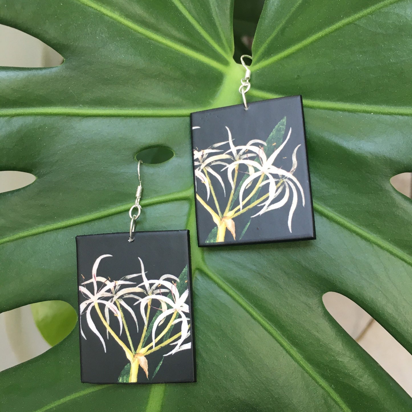 earrings on sustainable wood with a figurative floral detail from a collage by famous English artist Mary Delany.