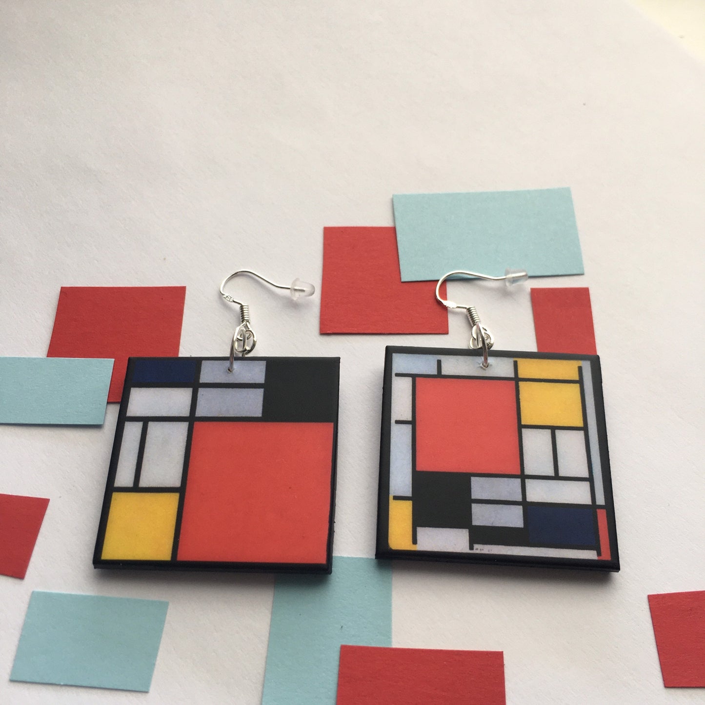Mismatched earrings inspired by Mondrian.