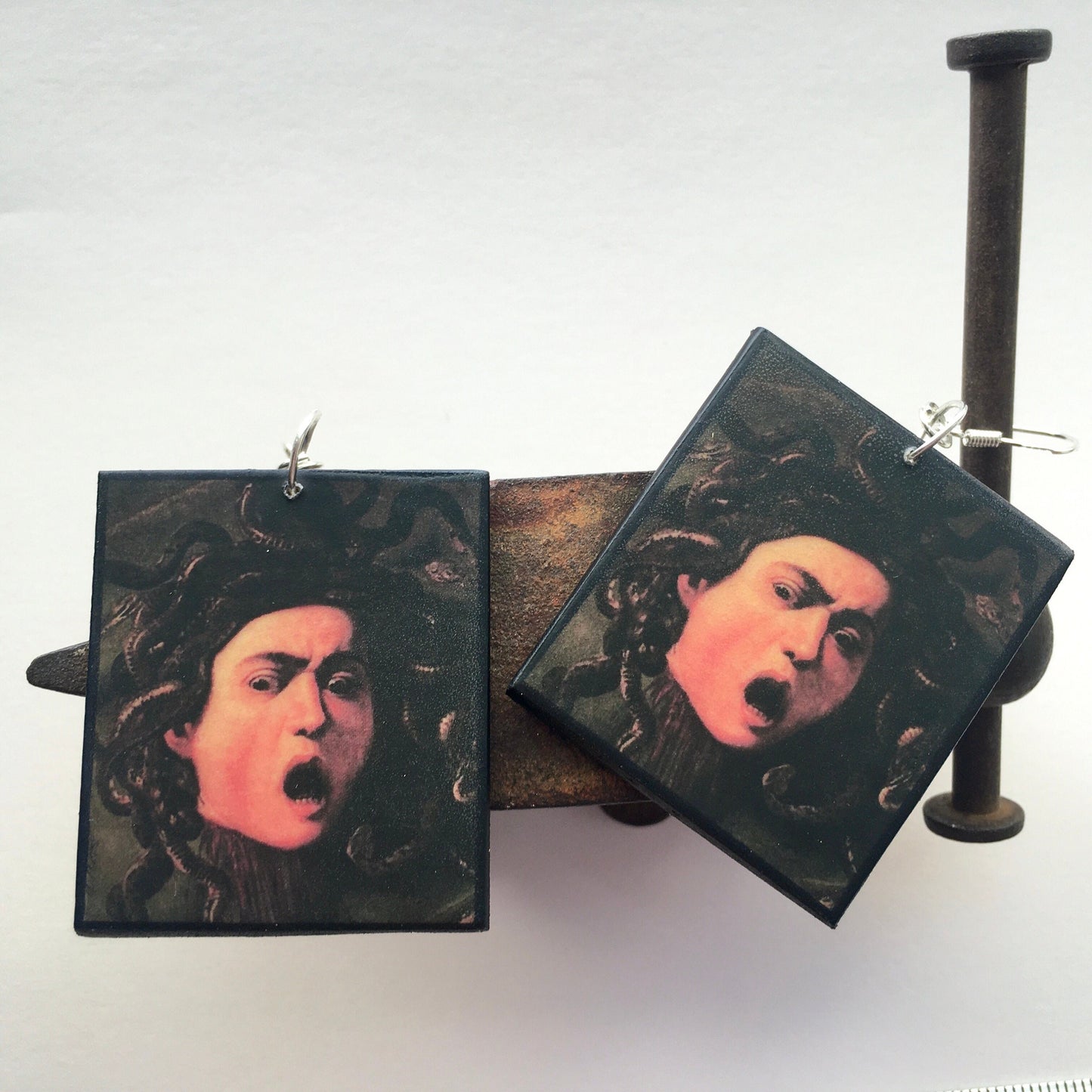 Medusa art earrings, impressive painting by Italian artist Caravaggio (Michelangelo Merisi). Lightweight wood, gothic style earrings with sterling silver hooks, completely handmade by obljewellery