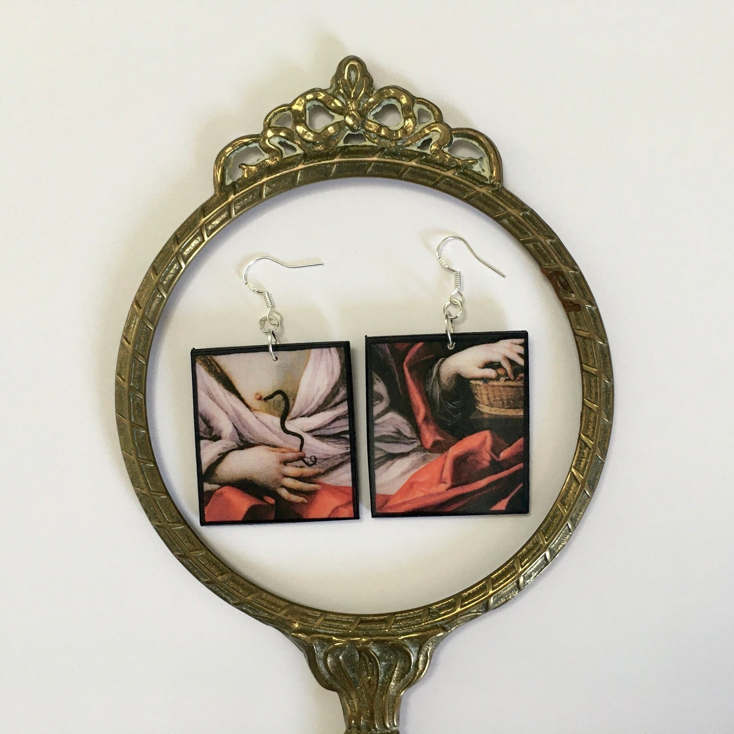 Cleopatra poisonous snake art painting by Italian artist Guido Reni on top of these aesthetic, uncommon, lightweight earrings. The earrings are made on sustainable wood with sterling silver hooks. Obljewellery artsy gifts.
