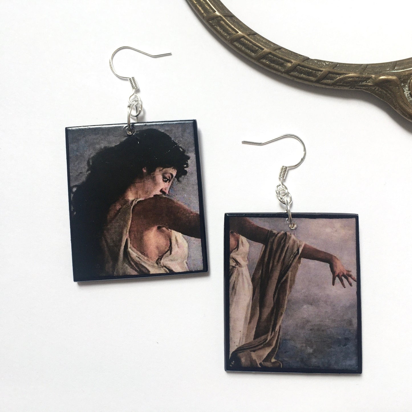 Sappho earrings by Obljewellery. The earring inspired by the paintig "The Death of Sappho" are on wood ad they are the simbol of love between wooman.