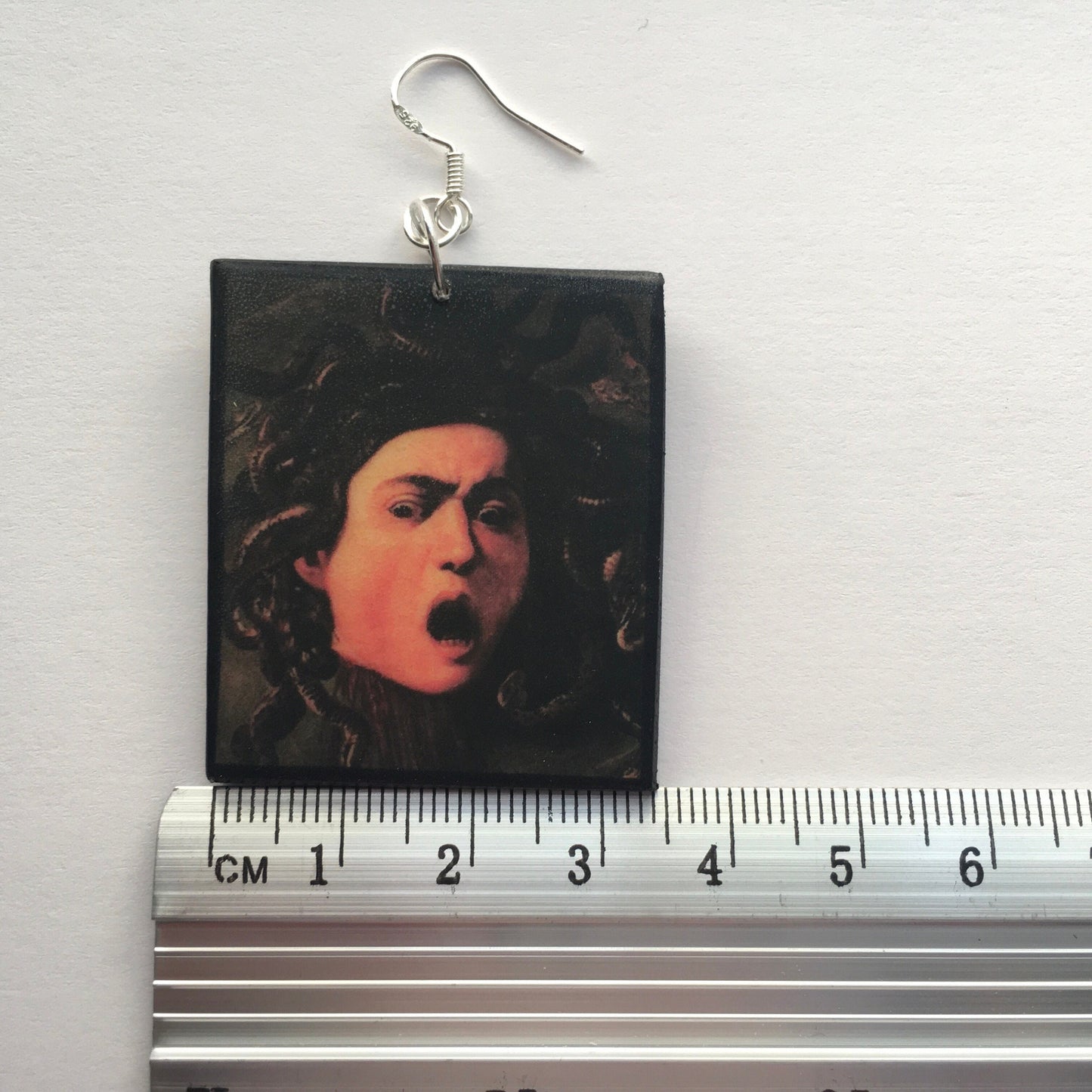 Medusa art earrings, impressive painting by Italian artist Caravaggio (Michelangelo Merisi). Lightweight wood, gothic style earrings with sterling silver hooks, completely handmade by obljewellery