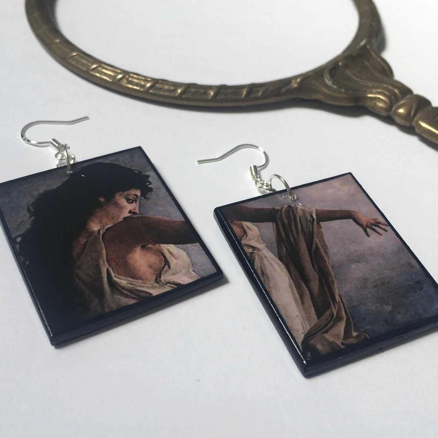 The Death of Sappho earrings, present on top side some detail of the impressive oil painting by Miguel Carbonell Selva. The earrings are completely handmade without any industrial process by Obljewellery. These aesthetic, lightweight earrings represent a story of Greek mythological sapphic art. Sustainable artsy gift