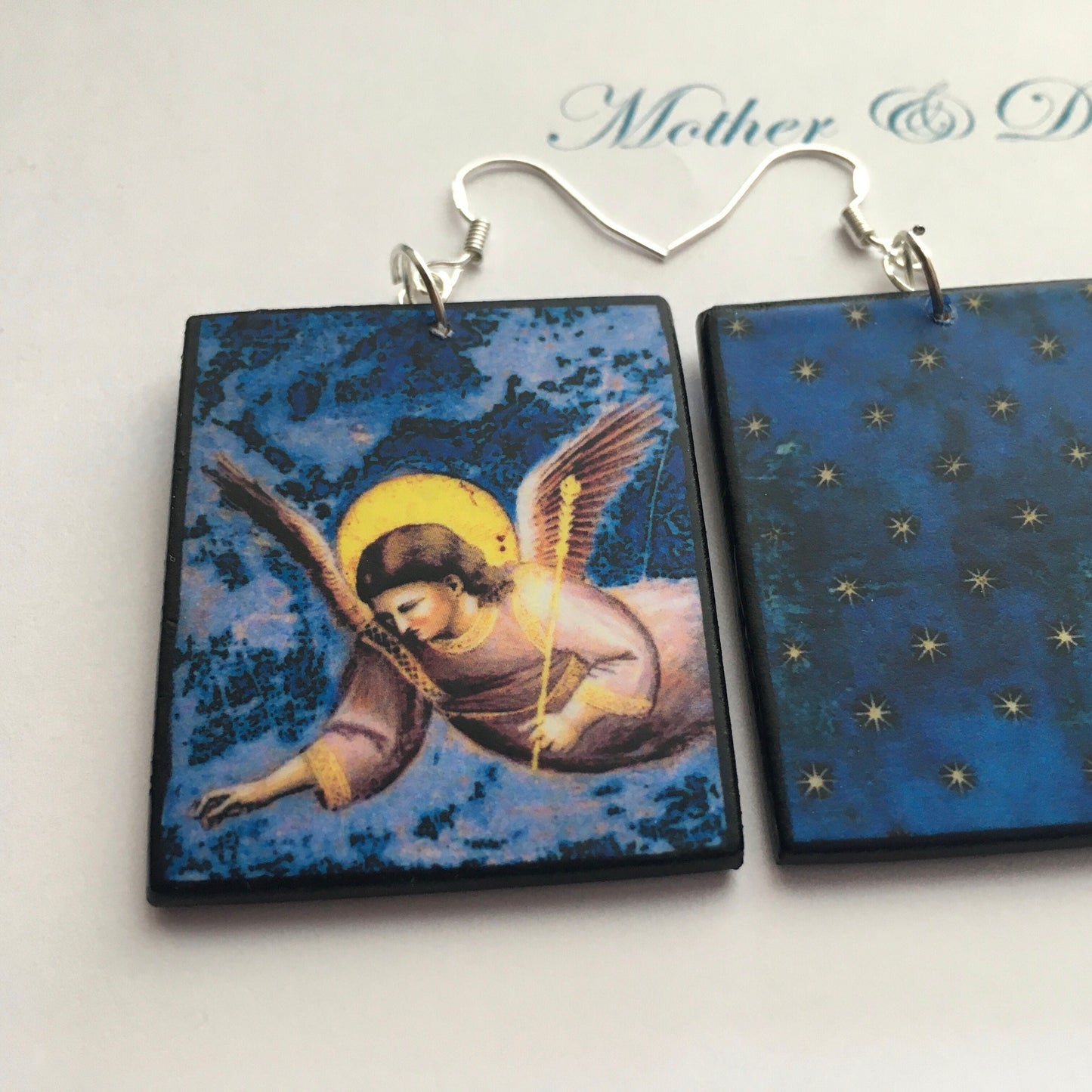 Giotto earrings, set o two pair of different size with art details from Cappella degli Scrovegni. Mother and daughter sustainable, artsy gift. Lightweight earrings on sustainable wood and sterling silver hooks earrings with a lapislaz starry sky and an angel.