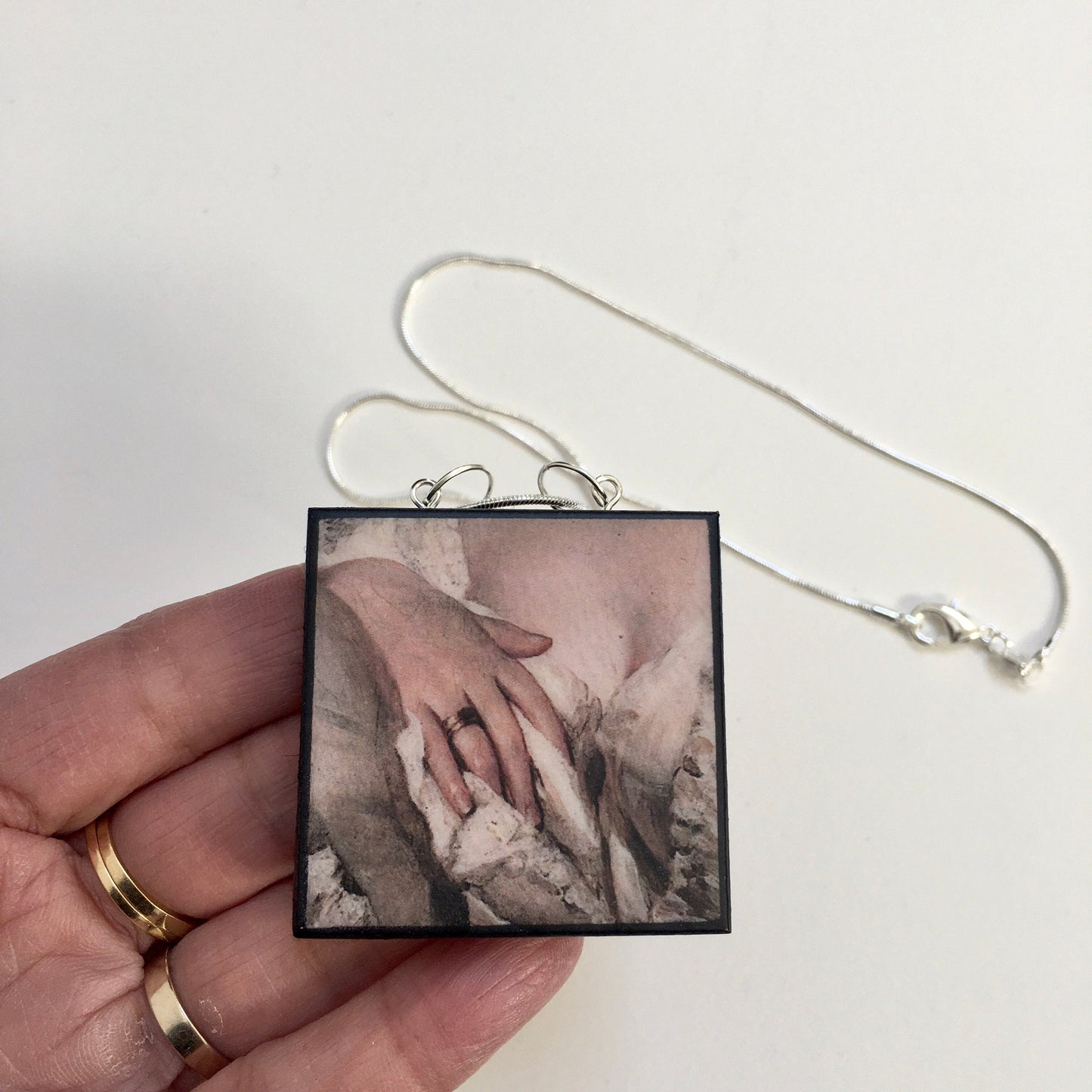 Sensual art Rococo pendant necklace on sustainable wood and sterling silver chain. Handmade by Obljewellery