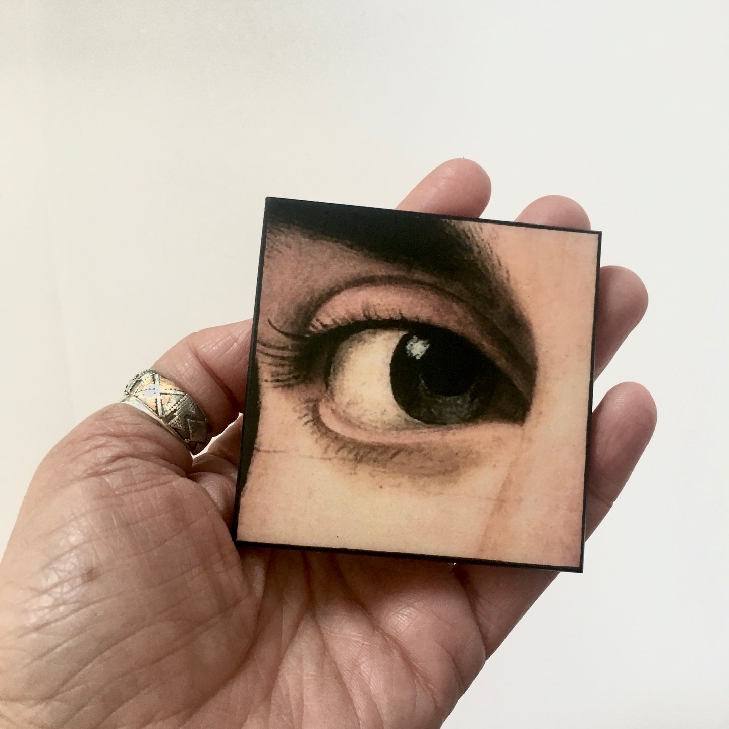 Renaissance eye detail, large wood brooch