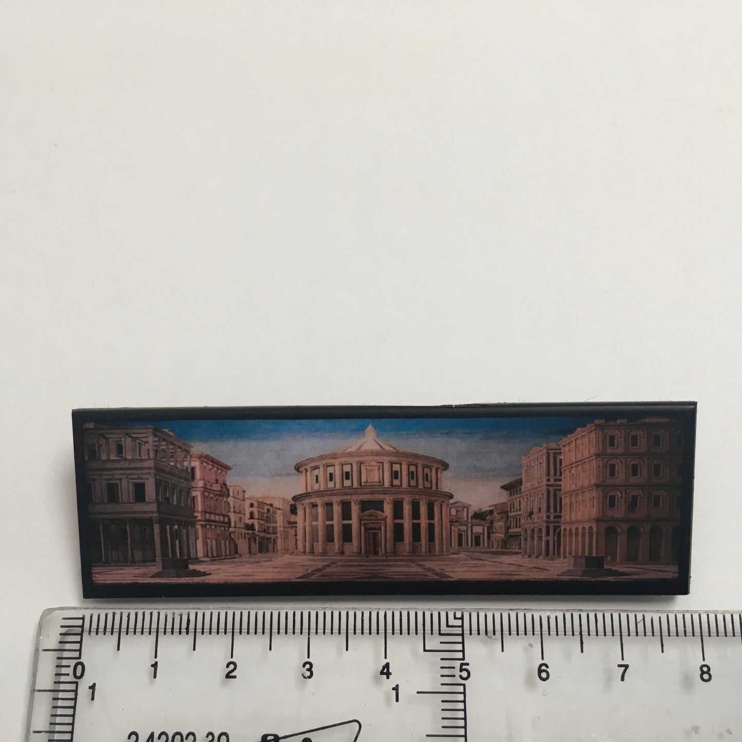 The IdealCity of Urbino, Berlin and Baltimore brooches