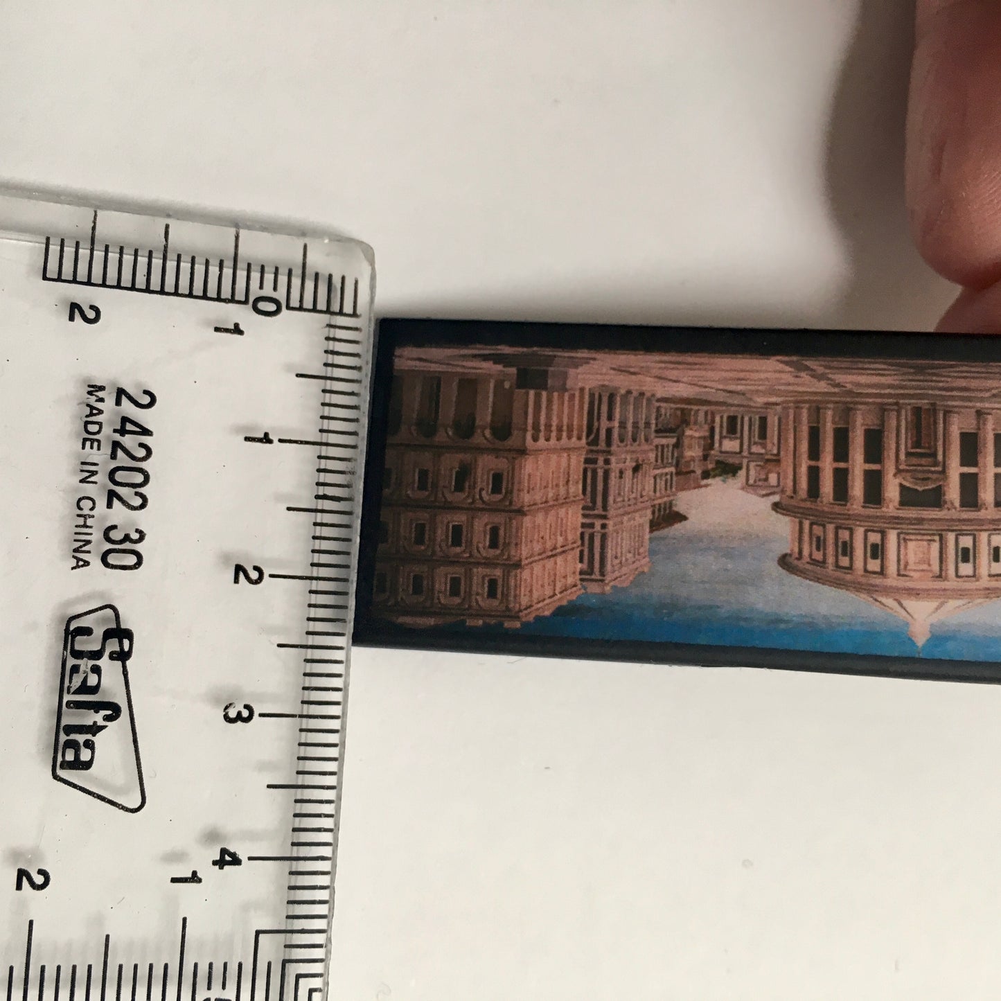 The IdealCity of Urbino, Berlin and Baltimore brooches