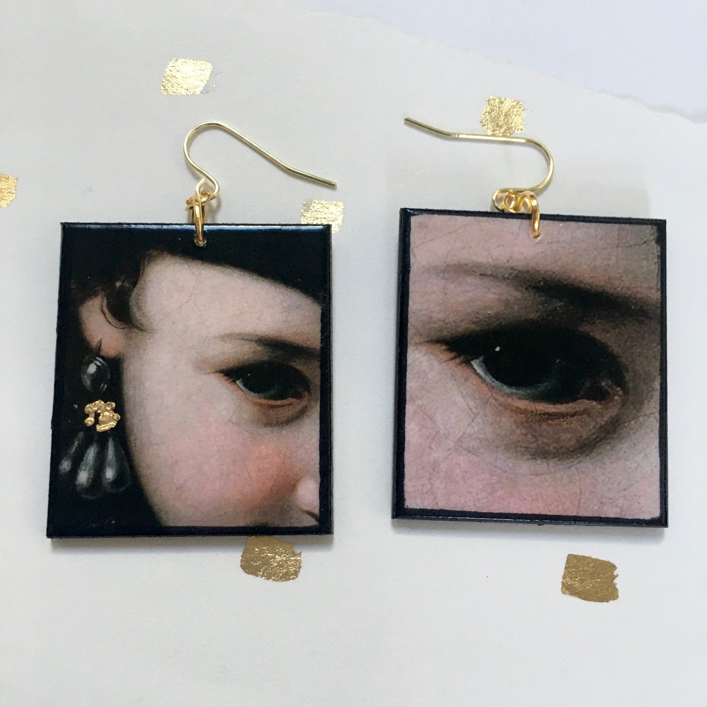 Sustainable wood earrings with eyes details inspired by the Italian Baroque artist Pietro Antonio Rotari and his painting‘Girl with a Book’