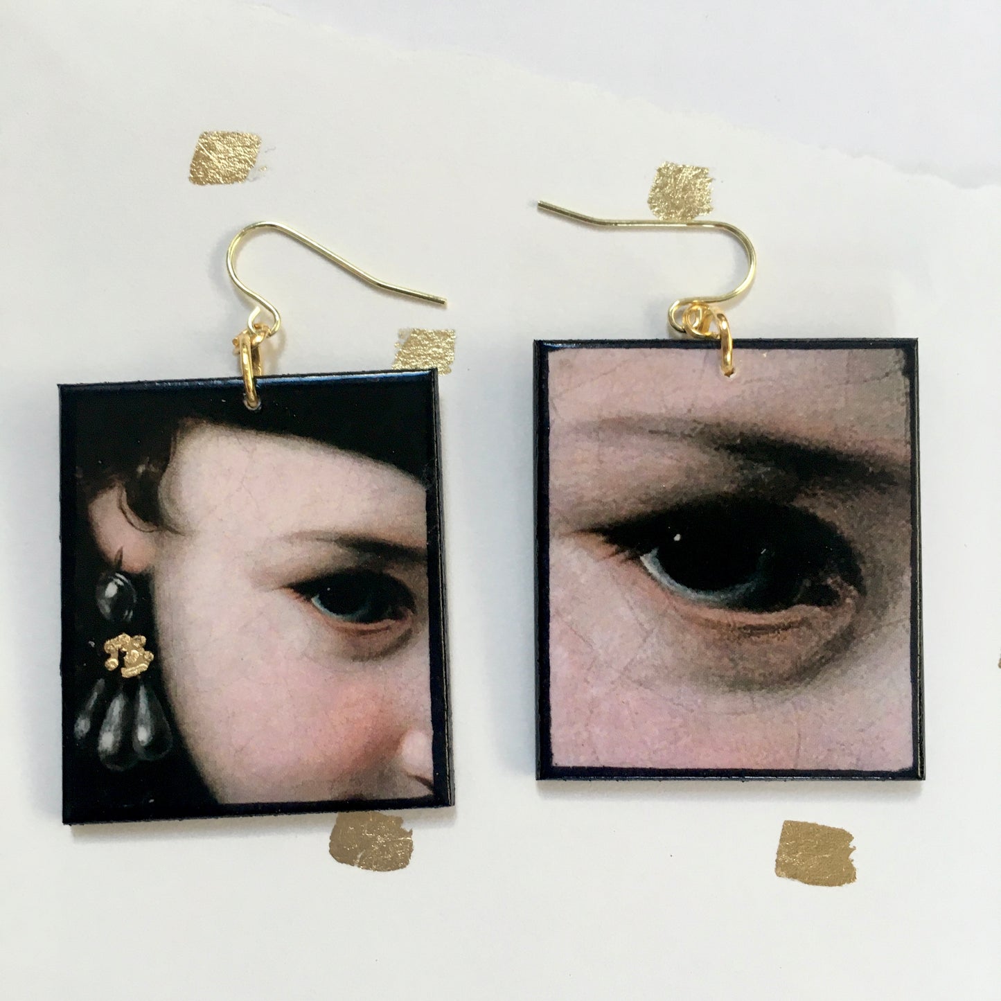 Sustainable wood earrings with eyes details inspired by the Italian Baroque artist Pietro Antonio Rotari and his painting‘Girl with a Book’